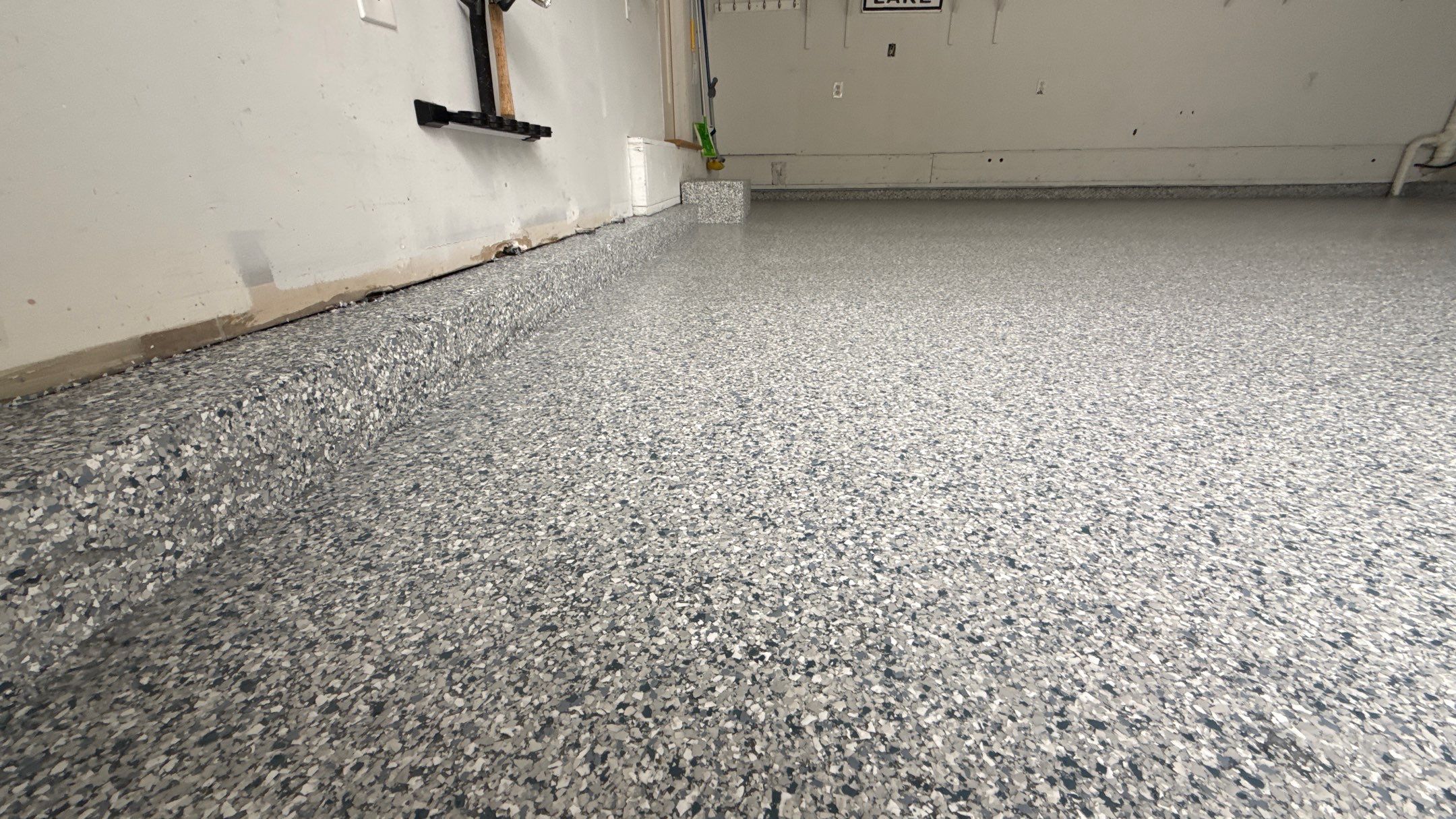 Another Beautiful Tidal Wave Flake Floor Looking Amazing  by Banner Garage