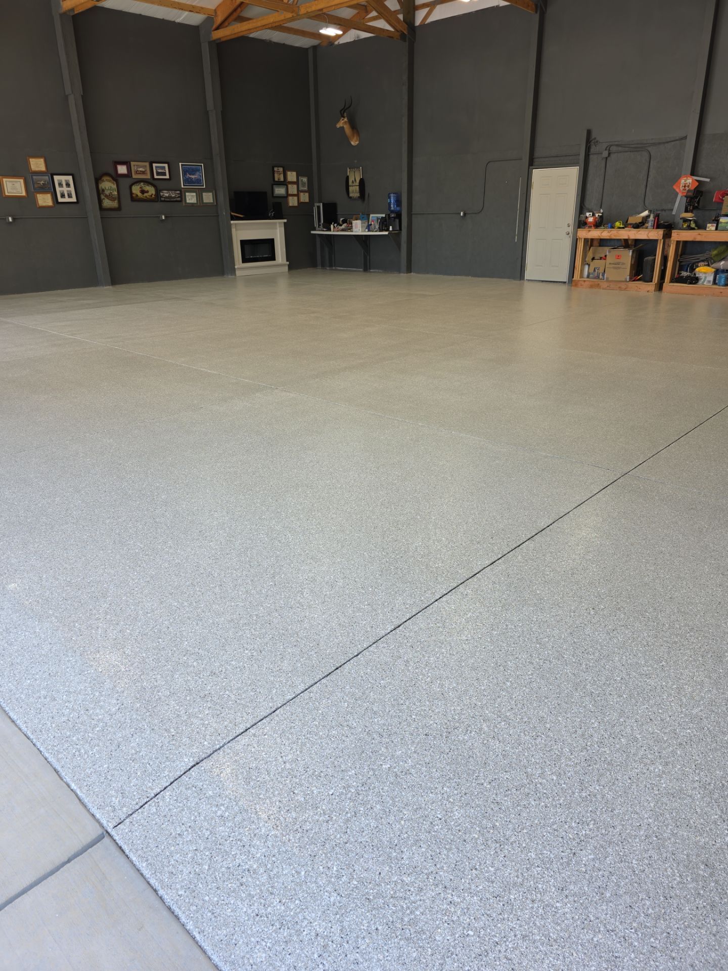 Airplane Hanger using Limestone Hybrid by Croc Coatings, LLC
