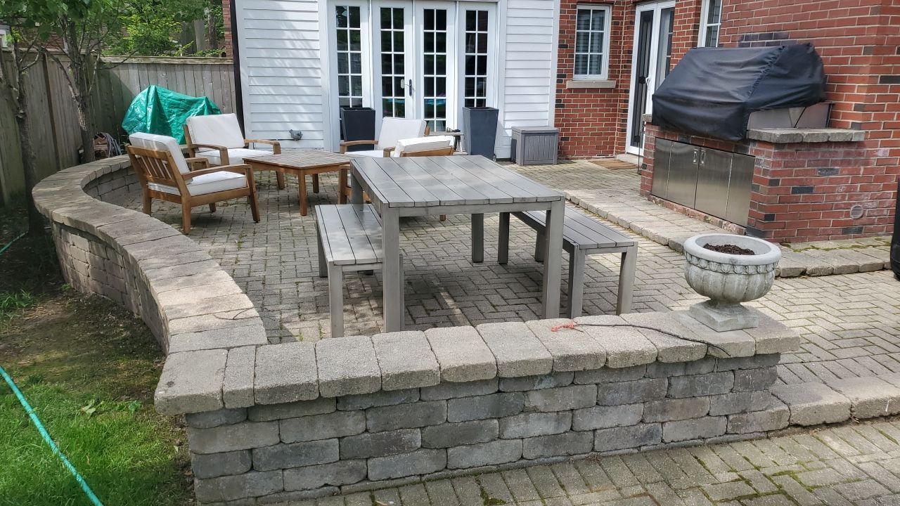Brick patio repair, clean sand and seal by Northern Power Washing LLC.