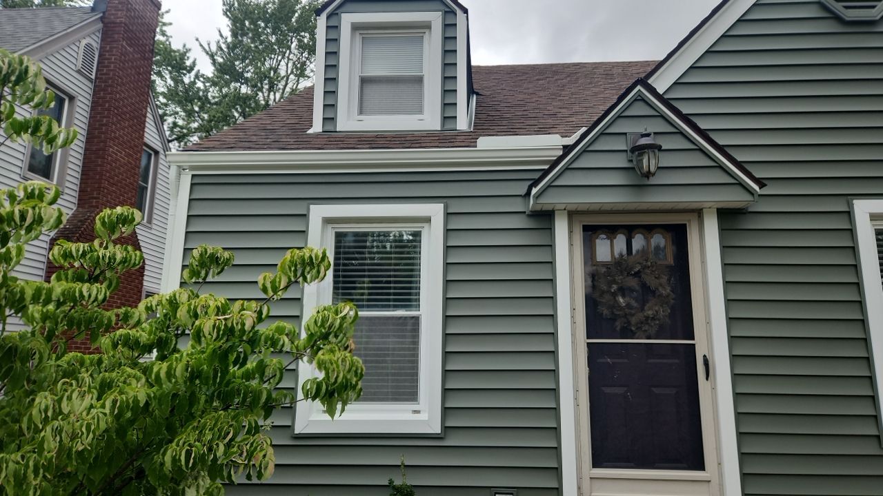 Siding Replacement using CertainTeed Restoration Classic D5 Forest Green by 180 Contractors