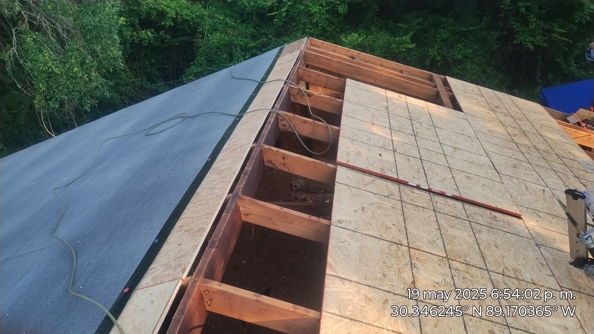 Attic repair and roof replacement by Husband Roofing & Contracting