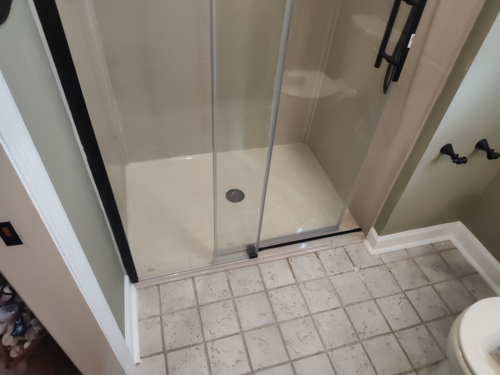 Bathroom Remodel using Onyx by Cornerstone Home Builders, LLC