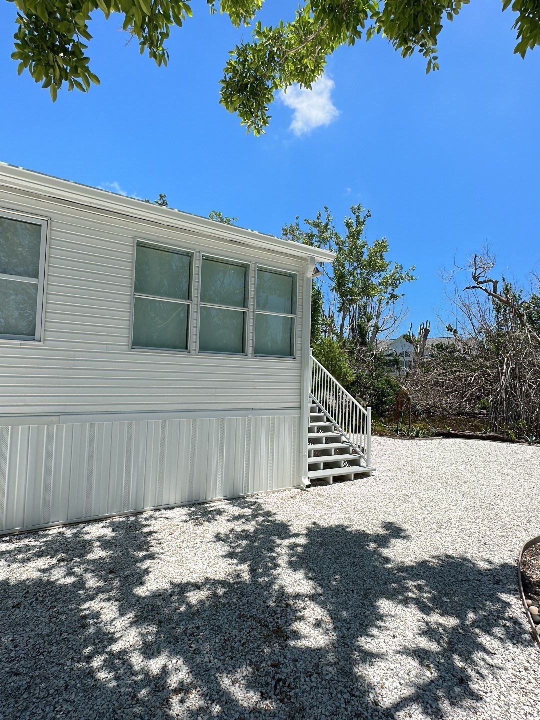 Downspout Installation using Charcoal Grey in Sanibel FL by Gutter Professors