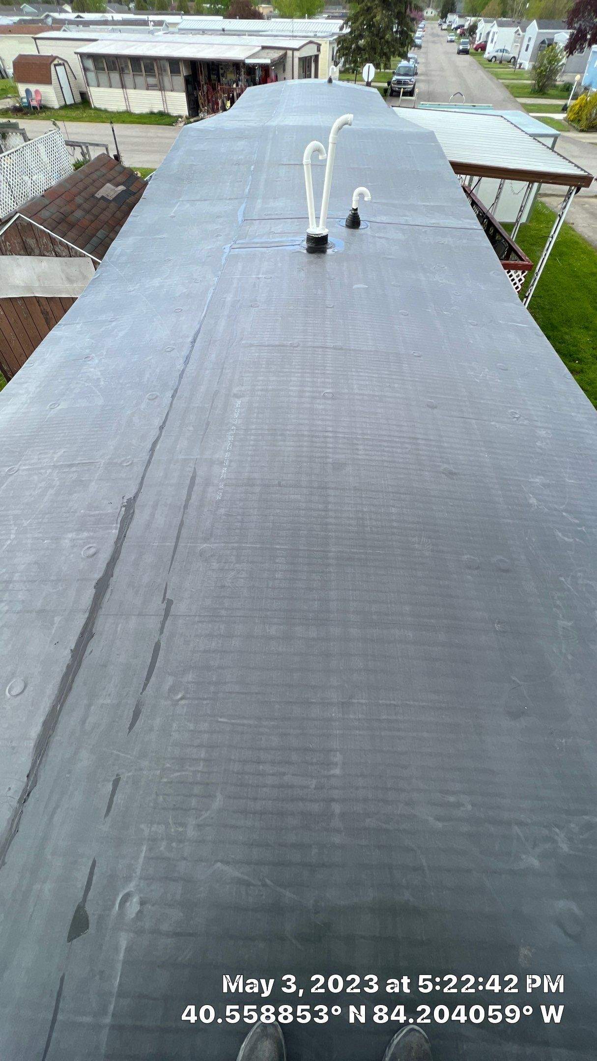 Residential Roofing Installation using 60 mil rubber roof  by Nitro Roofing and Construction