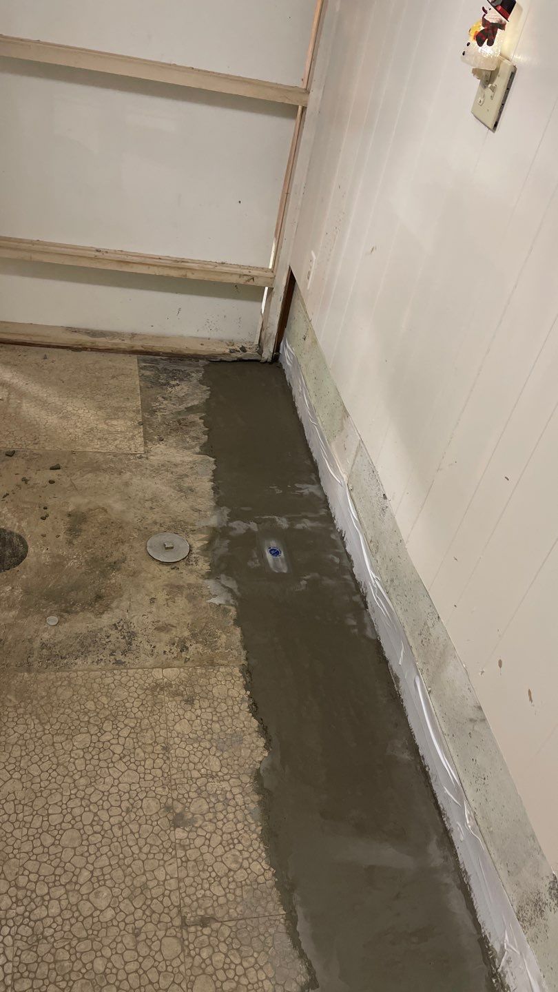 Interior Waterproofing Using GrateDrain™ Products by Toledo Basement Repair 