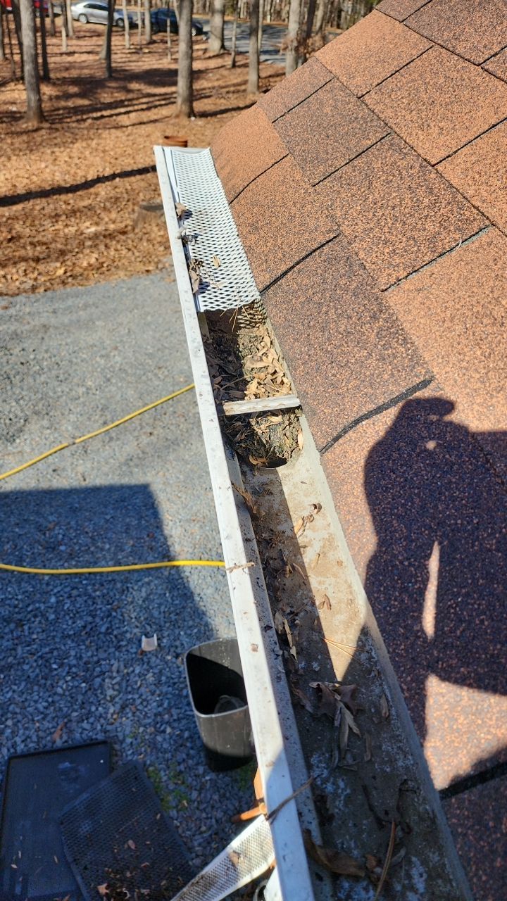 Gutter and Roof cleaning using cleaner by G&H Home Tech Pros LLC