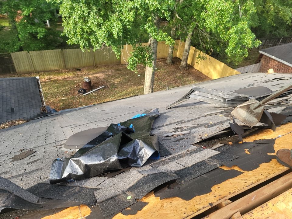 Residential Roofing Installation using Roof Replacement by American Roofing & Construction LLC