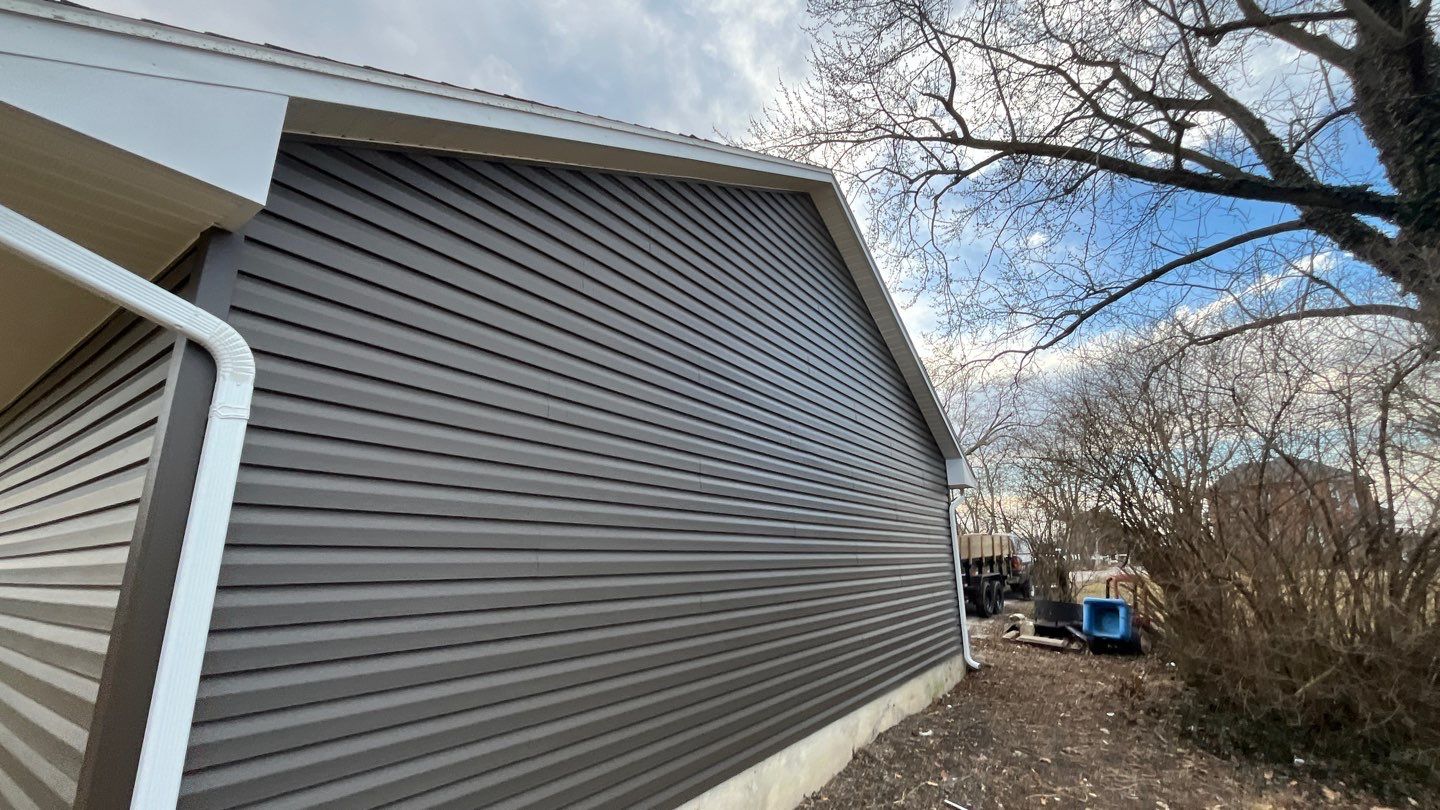 Residential fascia replacement using Exterior Portfolio 4.5 DL - Peppercorn by Nitro Roofing and Construction