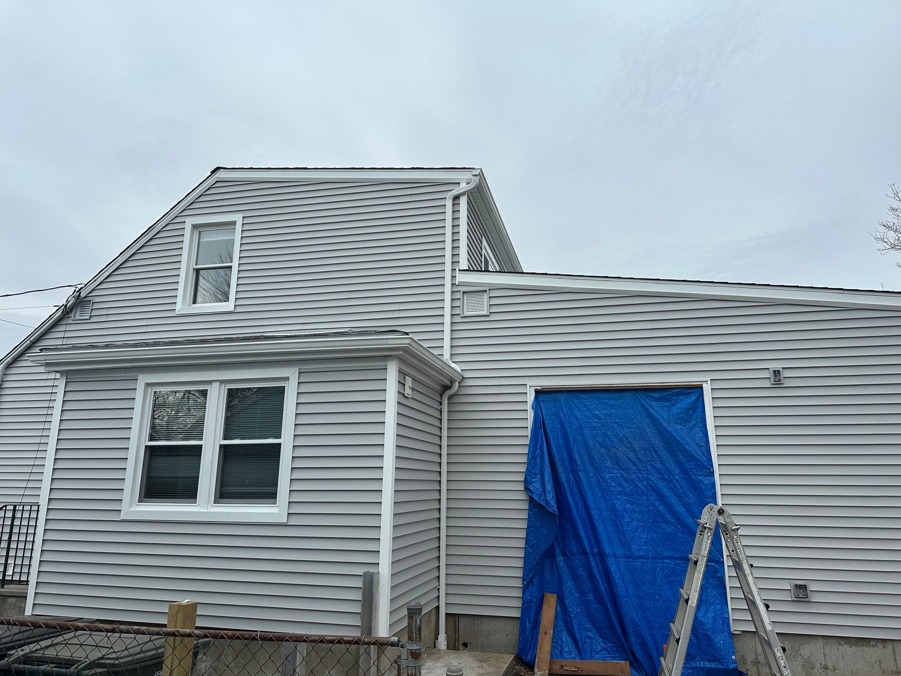 Siding Installation using CertainTeed Monogram Vinyl Siding - D4 - Sterling Gray by A Plus Exterior