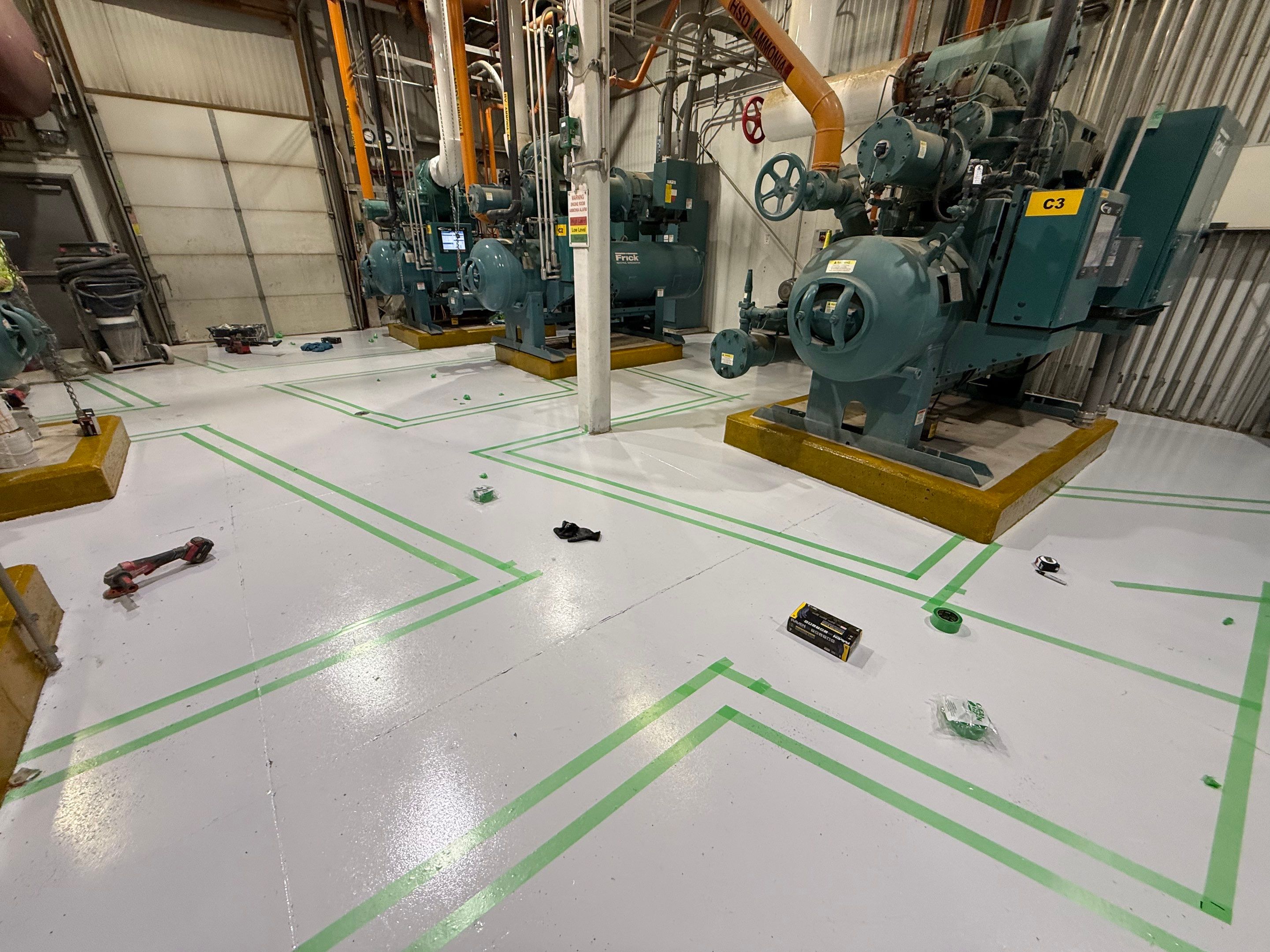 Industrial Epoxy Floor Coating for Perdue Premium Meat Co in Sioux Center by Select Painting, Coatings & Garage Cabinets