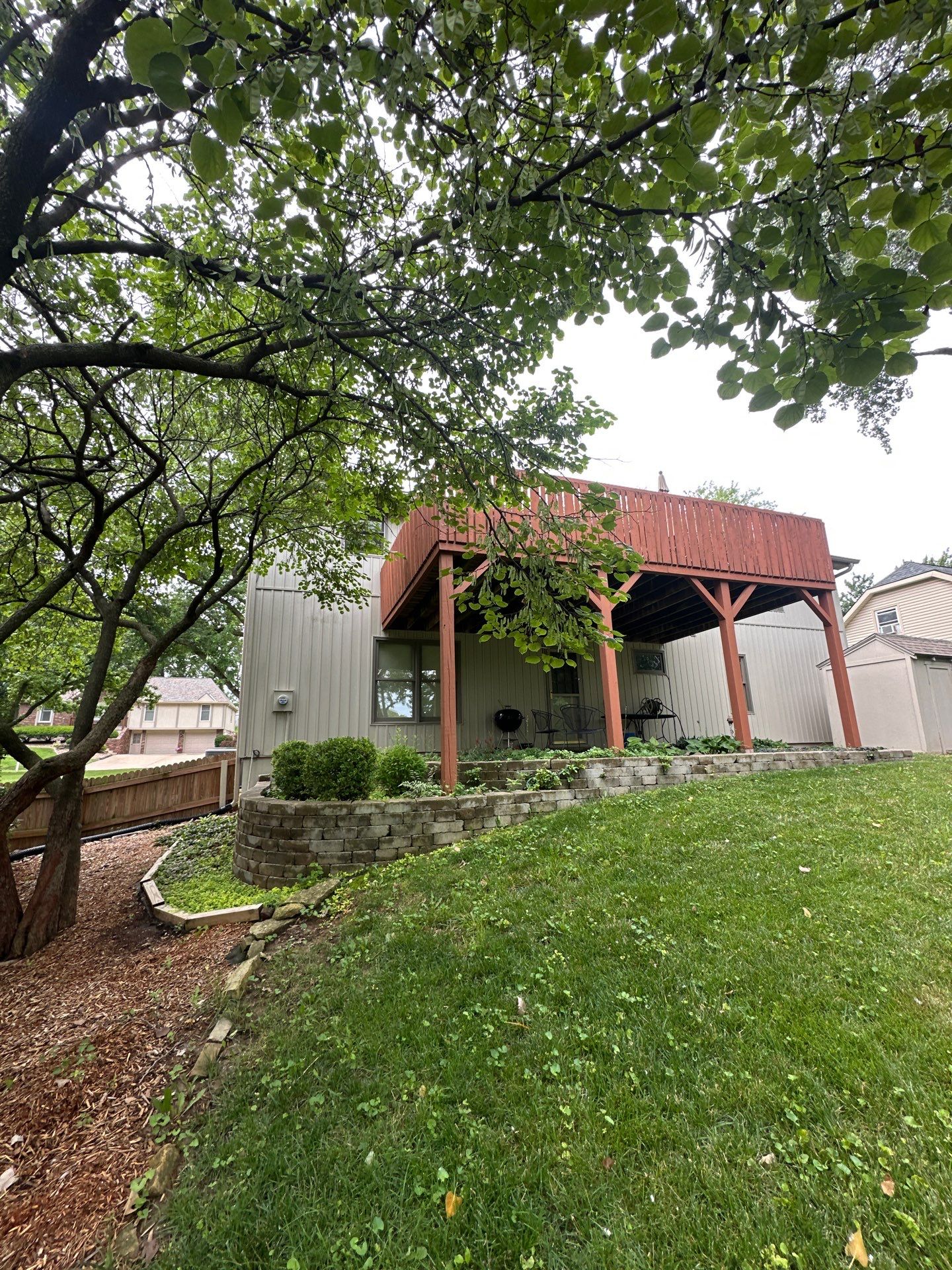 Comprehensive Kansas City Exterior Remodel Featuring Board And Batten Siding by EEC Windows, Siding & Roofing