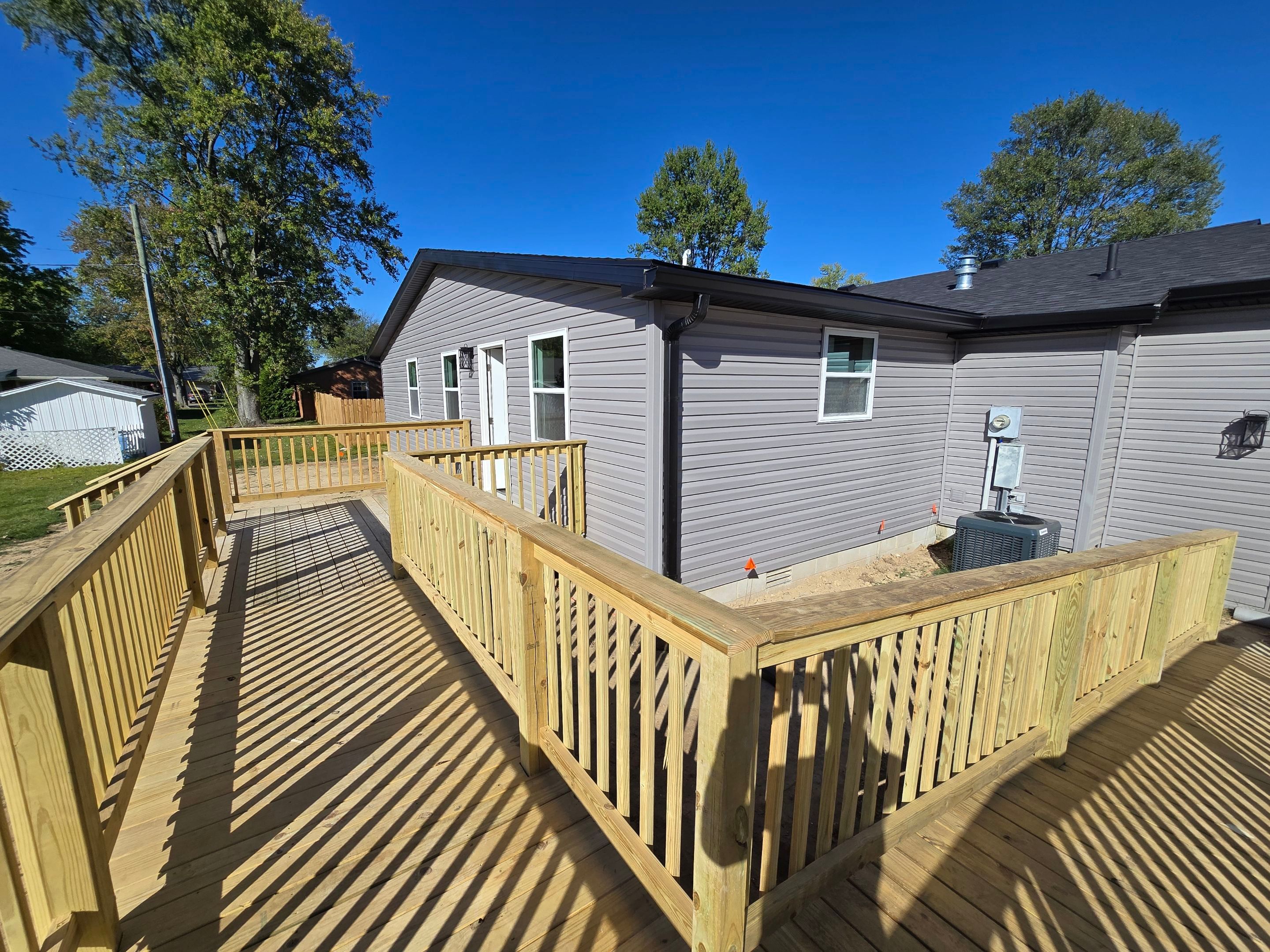 Major Addition using Vinyl Siding by Leach and Brown Construction LLC