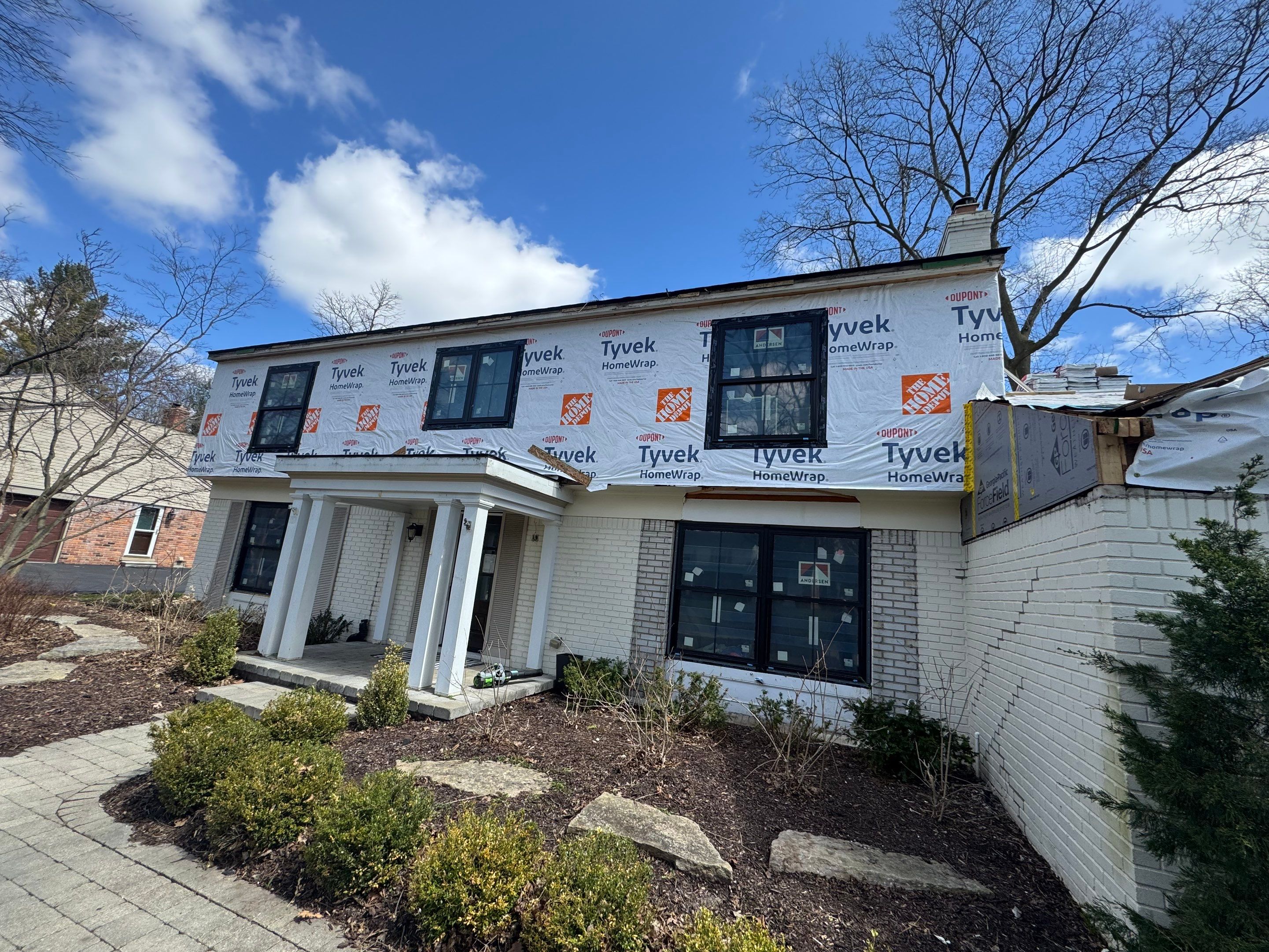 Siding Replacement using Hardie Plank S8 1/4"  Arctic White by 180 Contractors