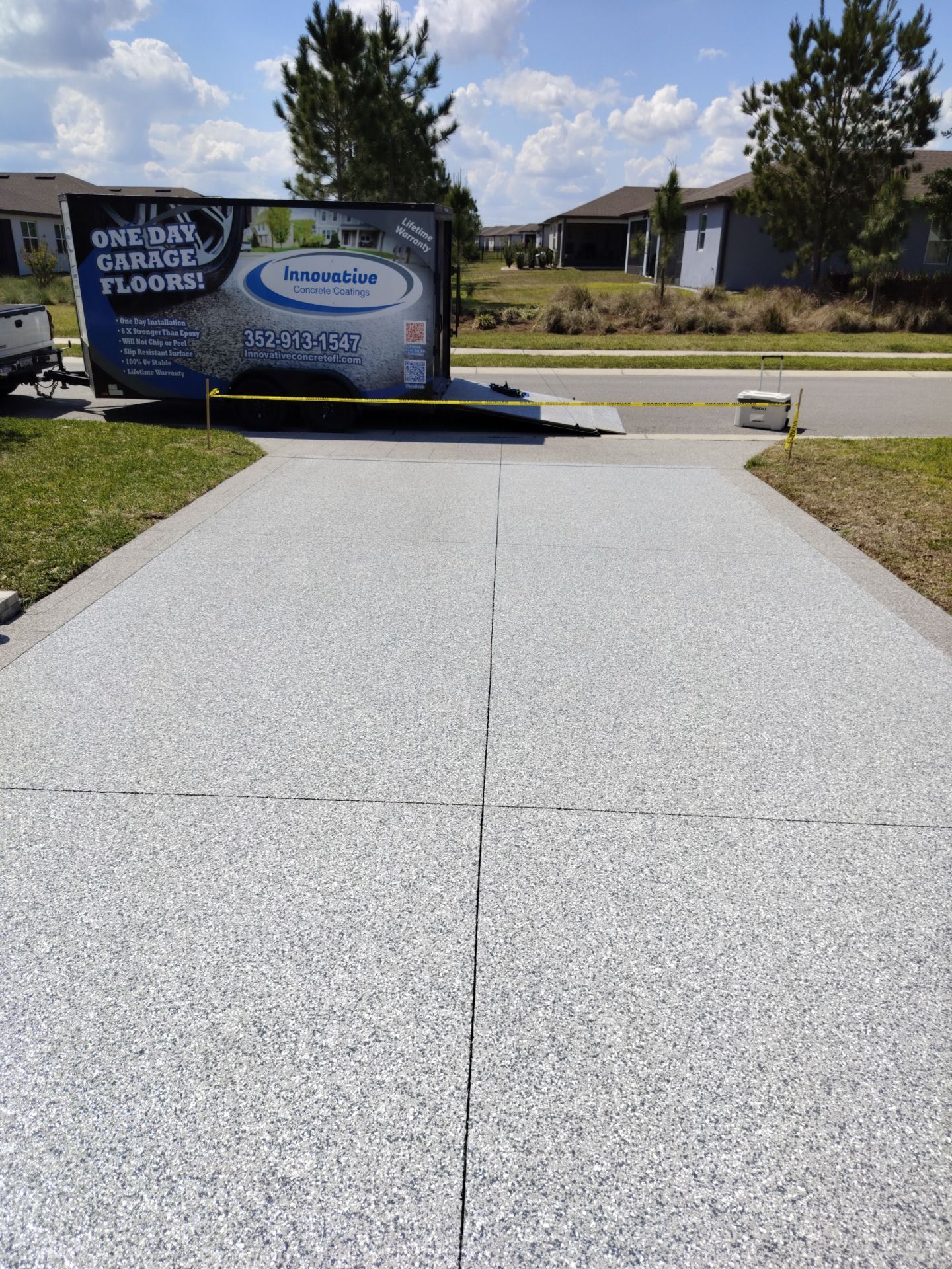 Driveway and Sidewalk in Slatestone with Silvercreek Border by Innovative Concrete Coatings 