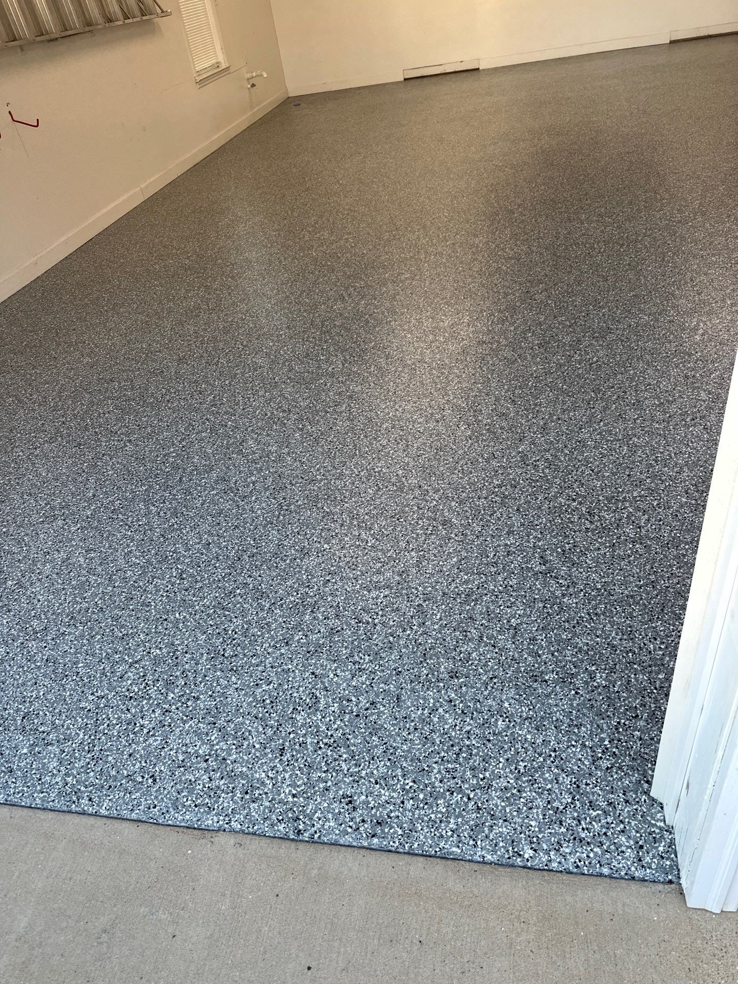 Garage Floor Coating using Wombat by My Garage Floor Guys