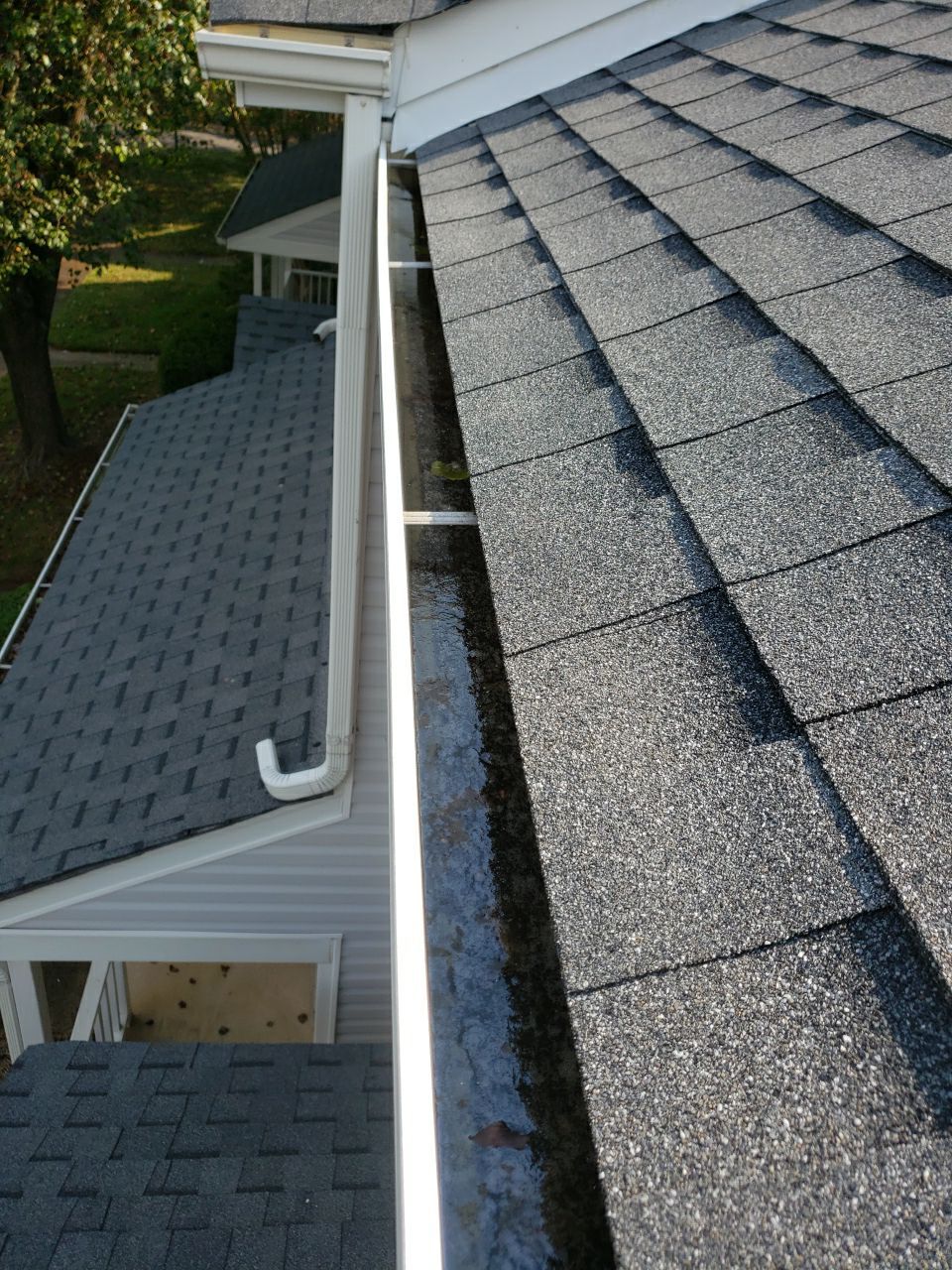 Gutter Cleaning using water by Power Wash Masters LLC