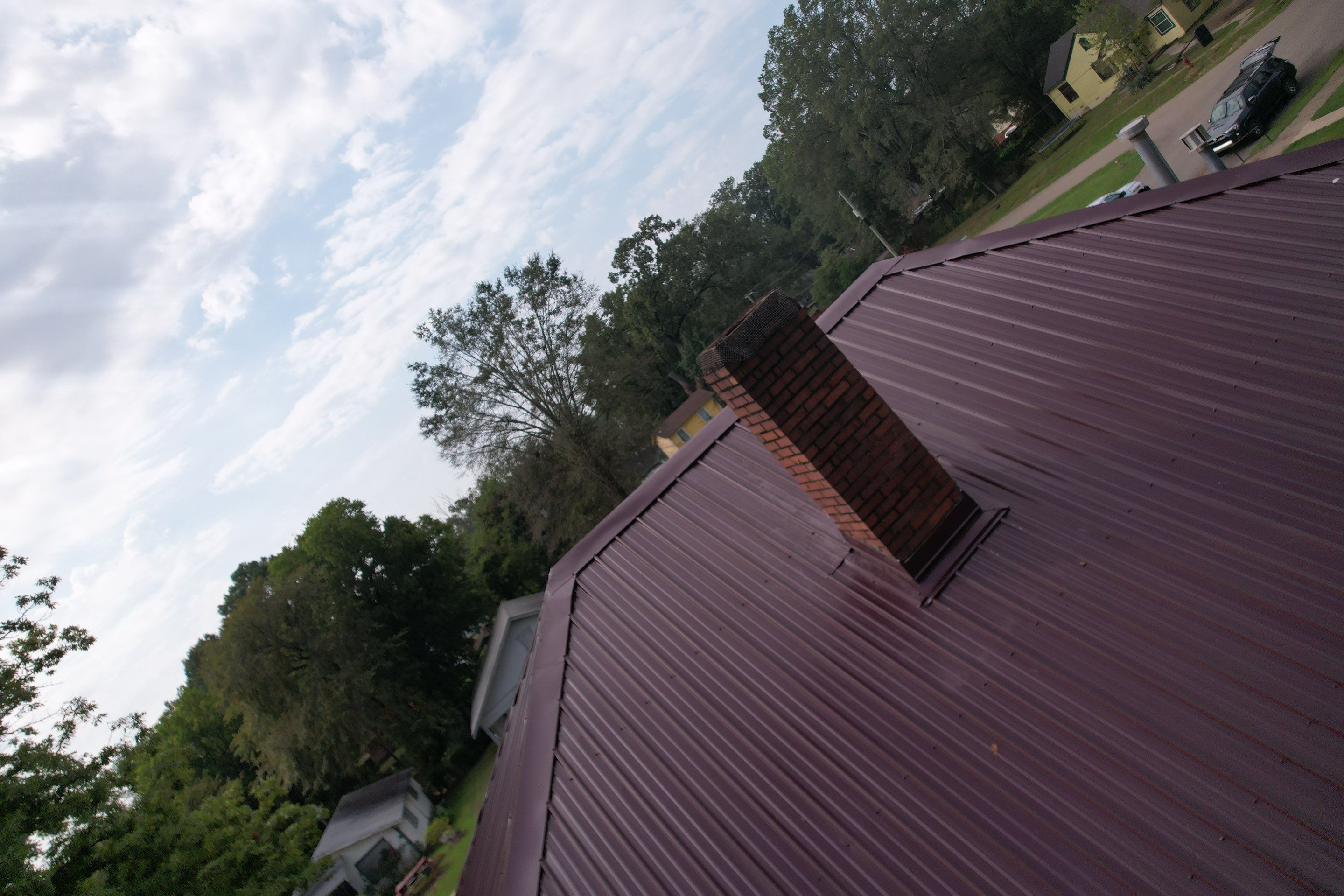 Residential Metal Roof Replacement using Reed's Metals: Colored Residental Panel (Burgundy) by Hostetler Roofing