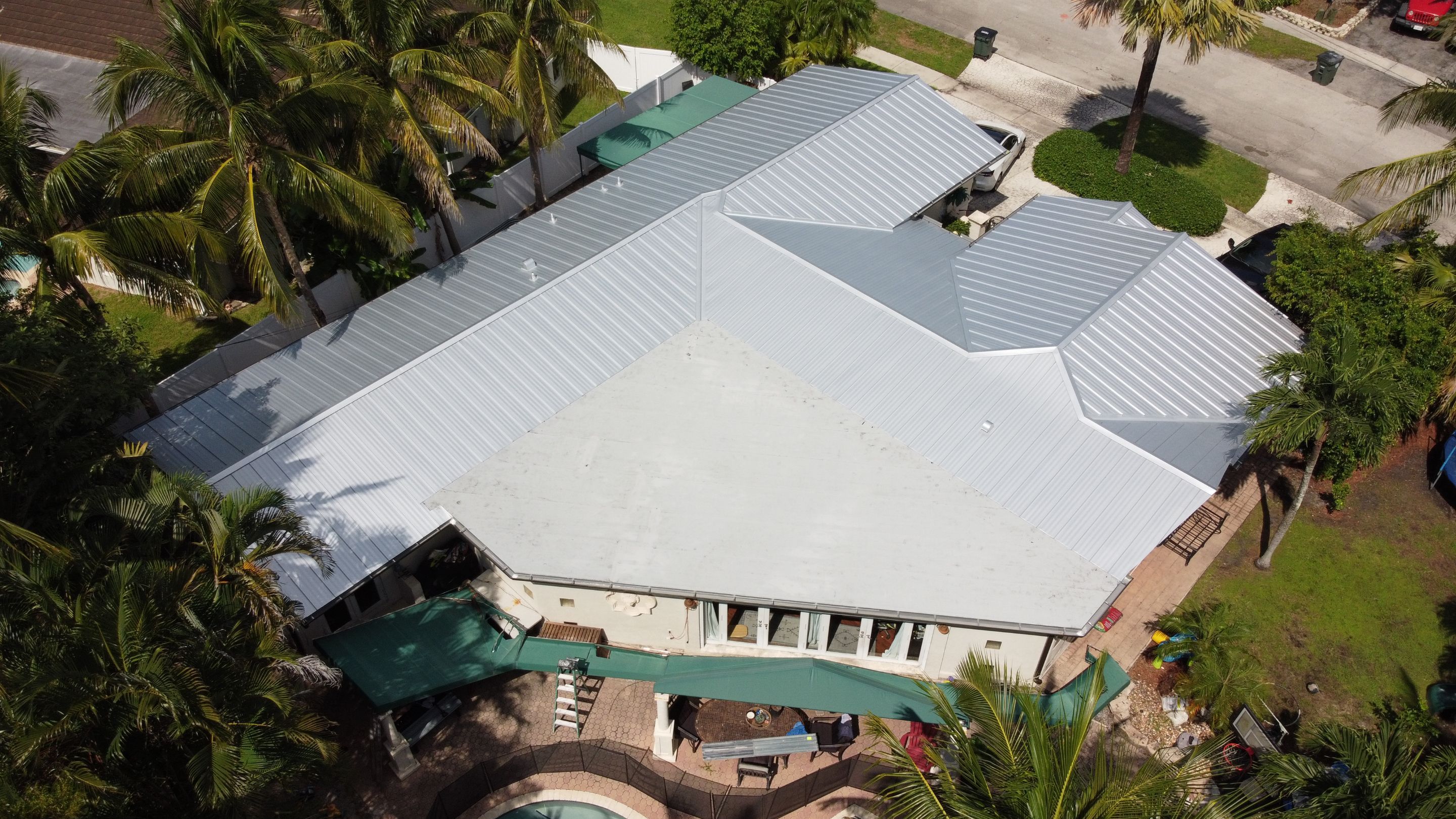 Residential Roofing Installation using 1" Nail strip metal roof by BLUES BROTHERS ROOFING