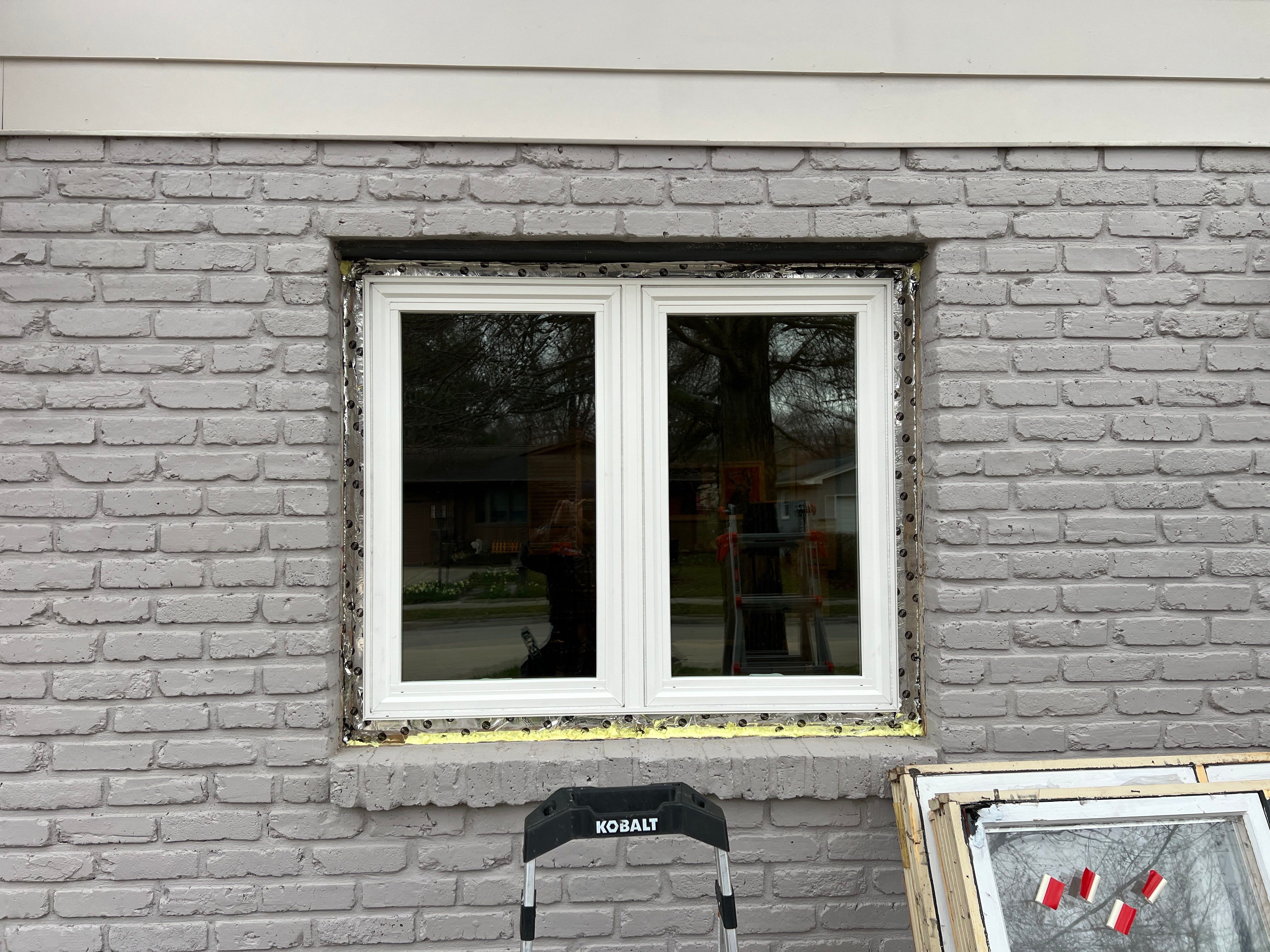 Window Installation using Pella 250 series vinyl window by United Windows and Siding LLC