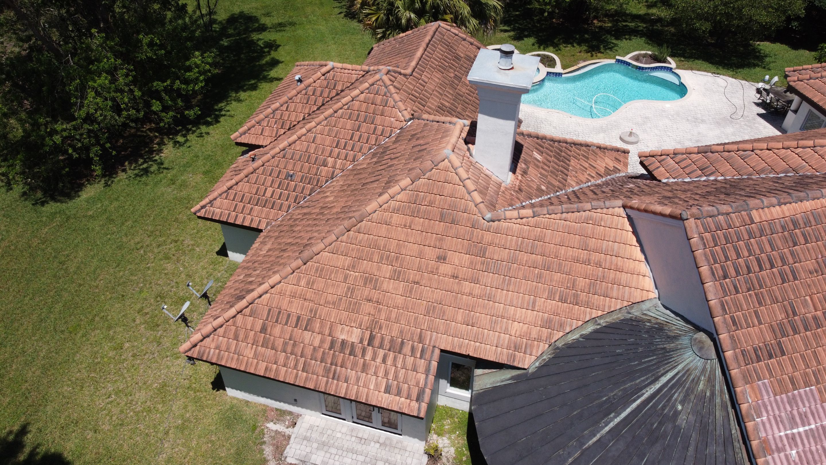 Residential Roofing Installation using 1" Nail strip metal roof by BLUES BROTHERS CONSTRUCTION CORP