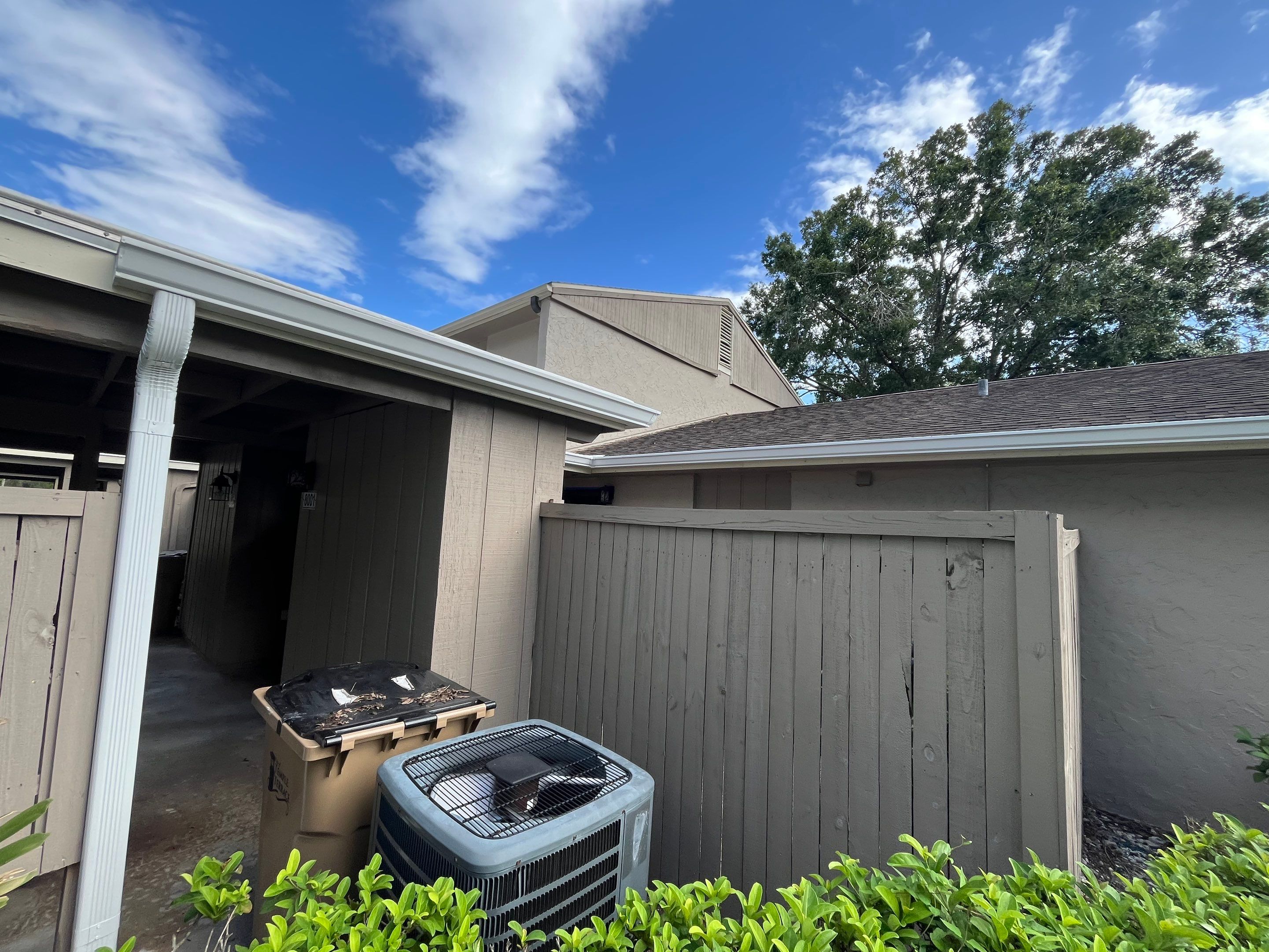 Professional Downspout Installation in Tampa, FL by Gutter Professor by Gutter Professors