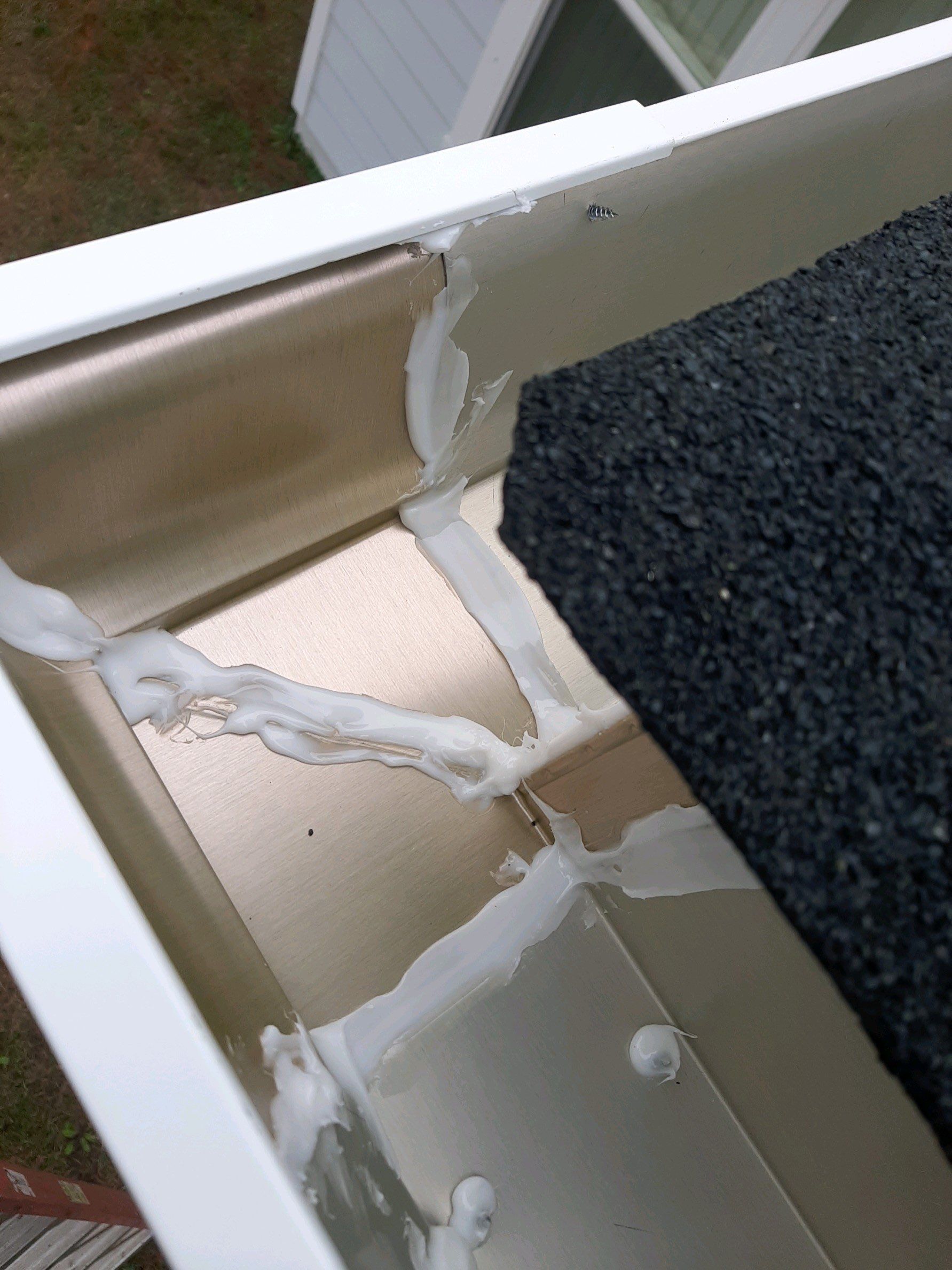 Gutter Installation using White K-Style Seamless Gutters by Gutter Professors
