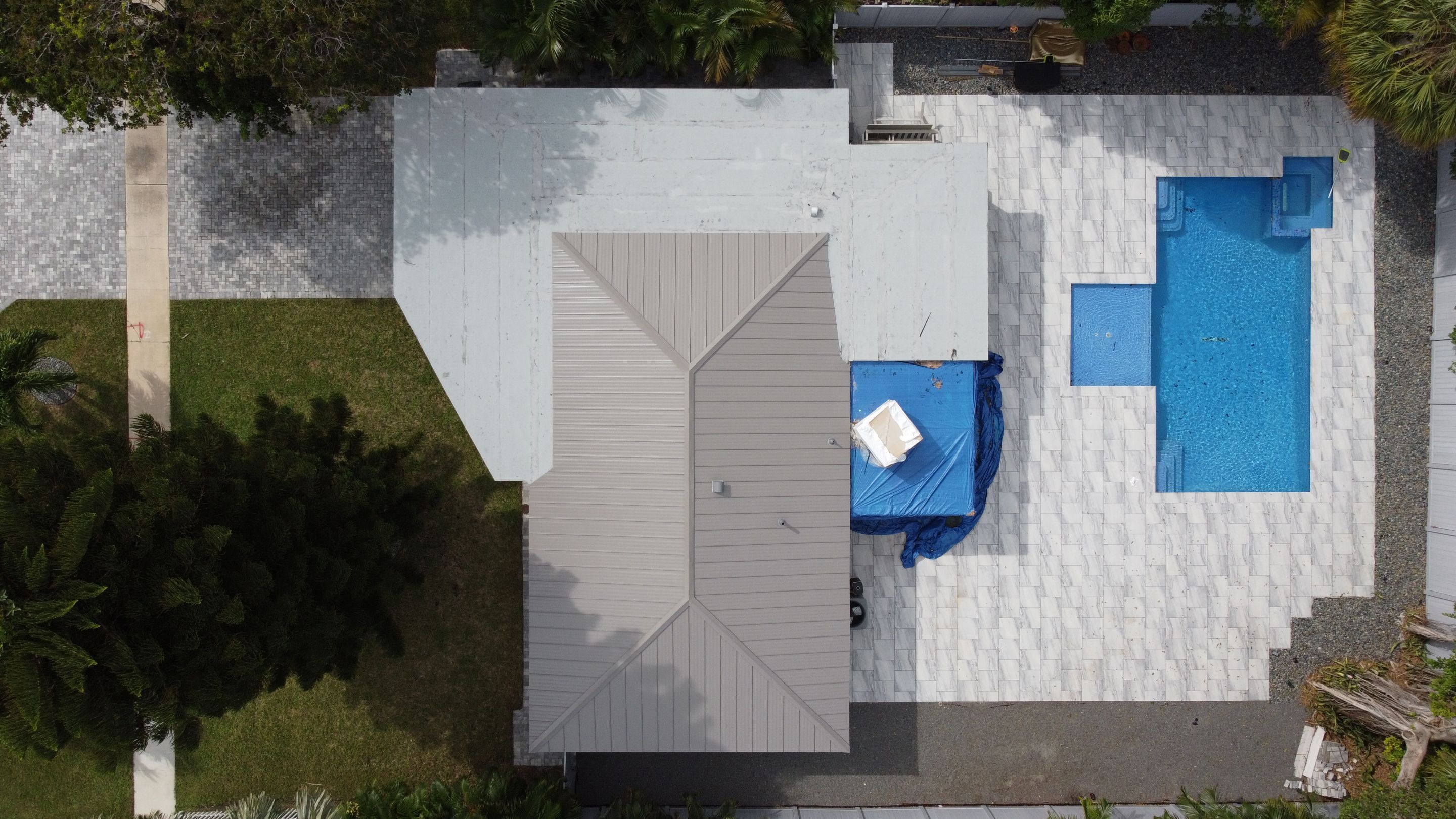 Residential Roofing Installation using 1" Nail strip metal roof by BLUES BROTHERS CONSTRUCTION CORP