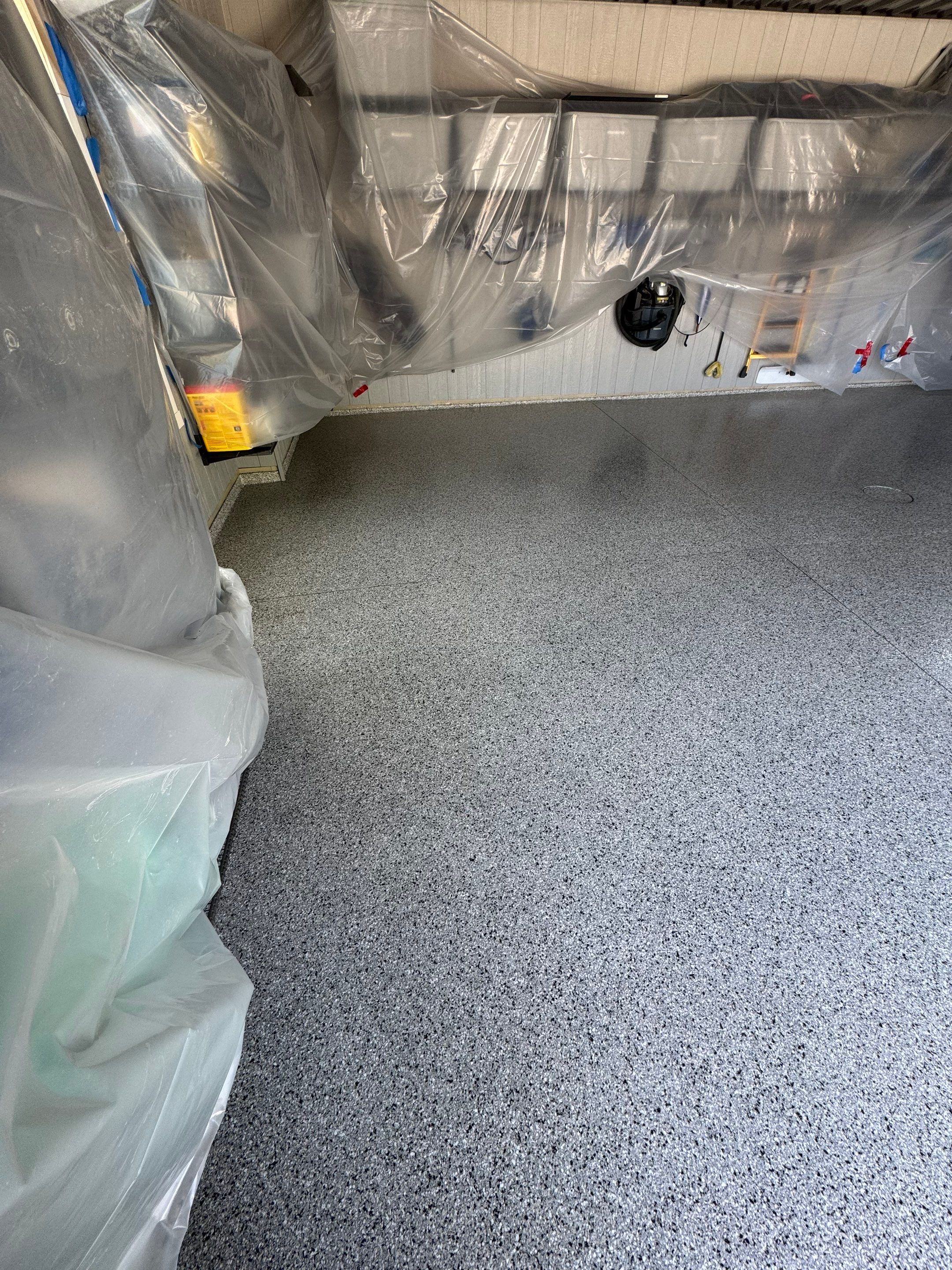 High-Gloss Grey Epoxy Floor Coating for Inwood Garage by Select Painting, Coatings & Garage Cabinets