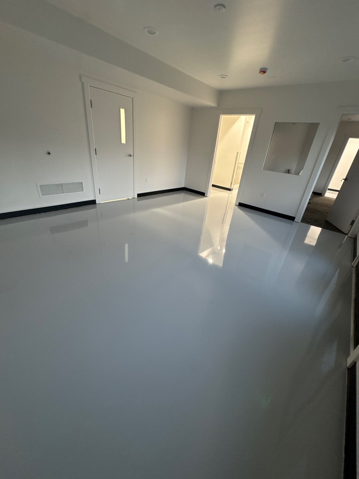Colfax Commercial Shop Transformation With Vapor Mitigating Floor Coatings by Croc Coatings, LLC