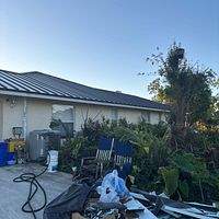 24ga 1.5" Mechanical Seam Dark Bronze by Total Roofing System The Metal Roof Experts