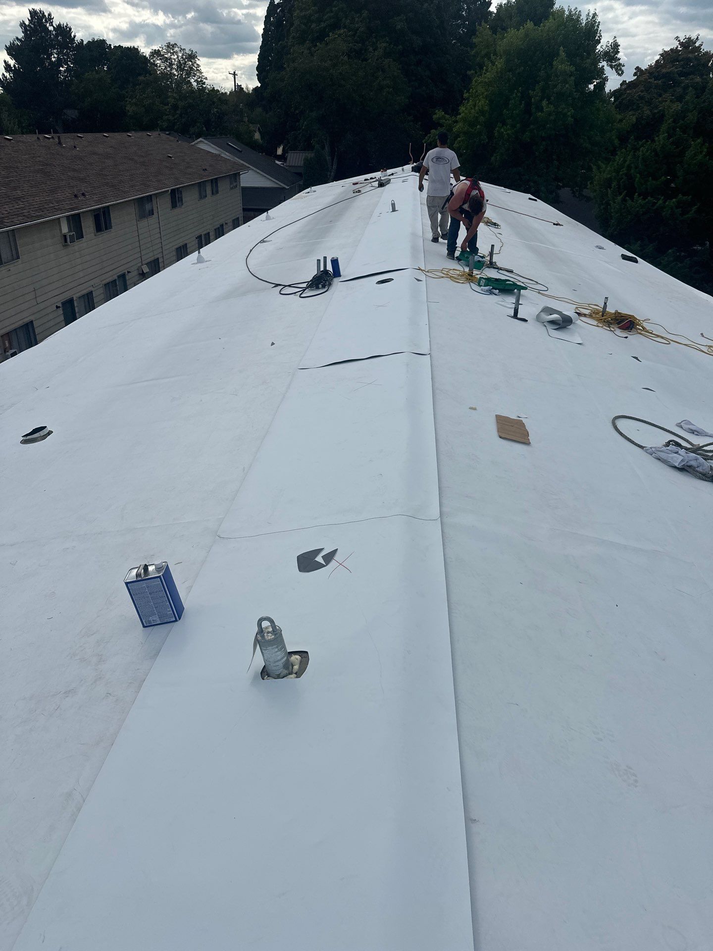 Commercial Flat Roof Installation using GAF 60Mil TPO  by Orezona Building & Roofing Company, Inc.