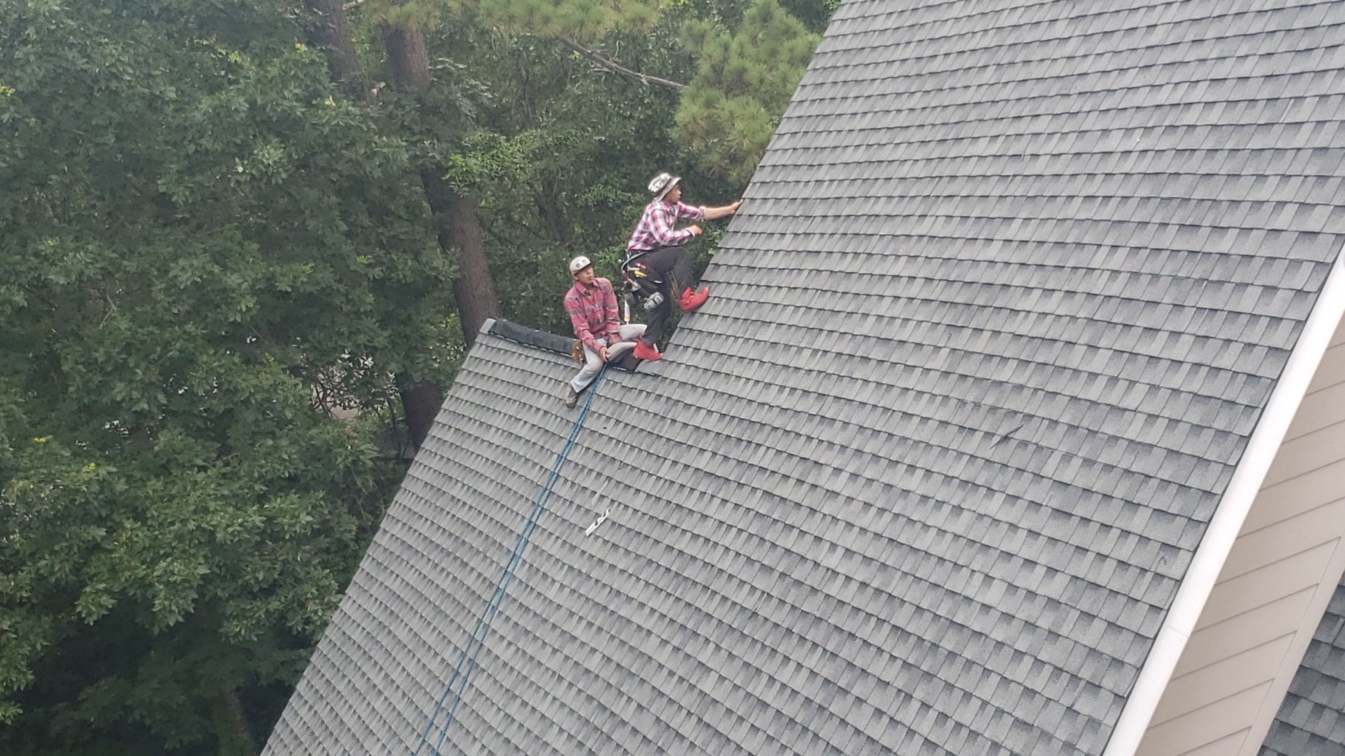 Residential Roofing Installation using Roof Replacement by American Roofing & Construction LLC