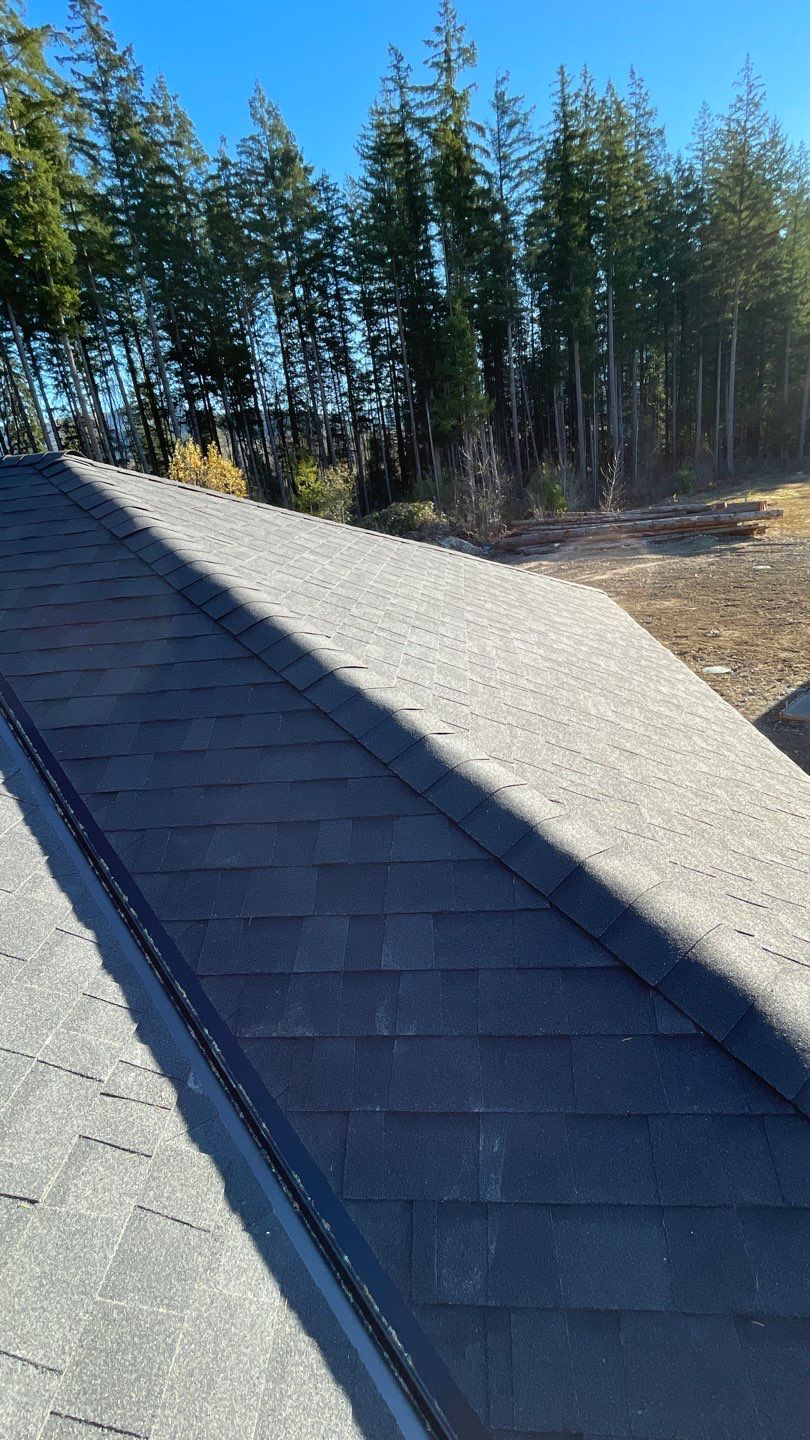 Residential Roofing Installation using OC Oakridge shingles by Top Notch Roofing Inc