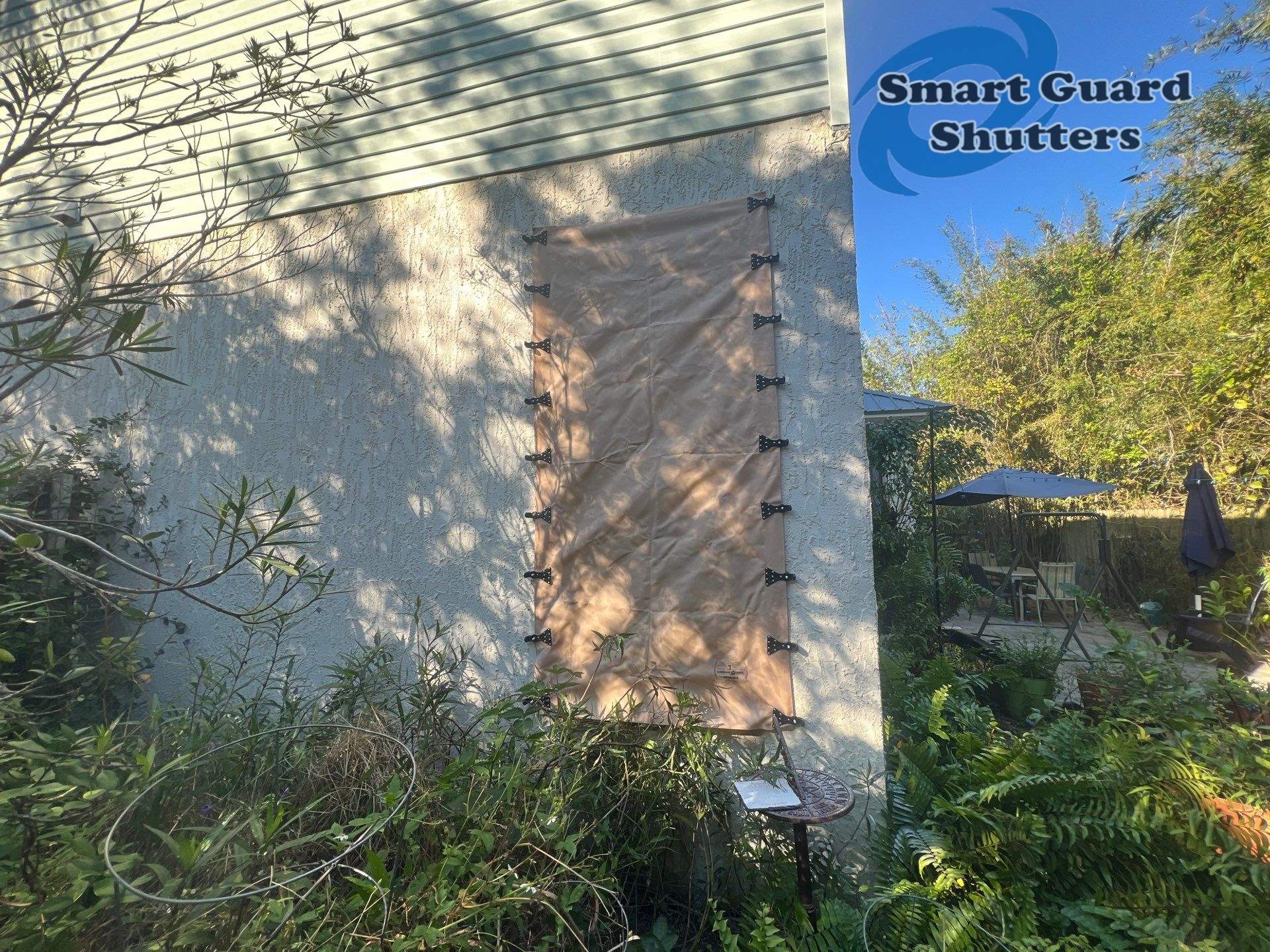 Hurricane Protection in Tan  by Smart Guard Shutters