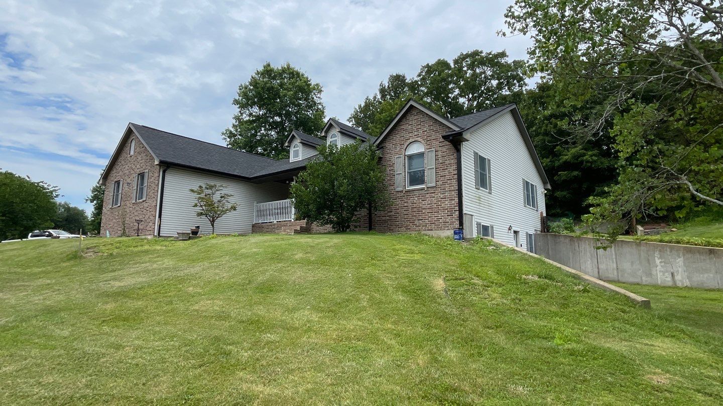 Residential Roof + Gutters & Downspouts & Gutter Guards Install  by Titan Commercial & Residential Roofing 