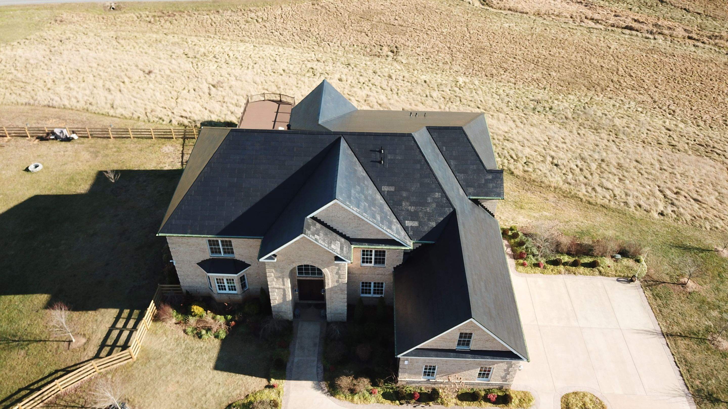 Tesla Solar Roof Replacement by American Home Contractors