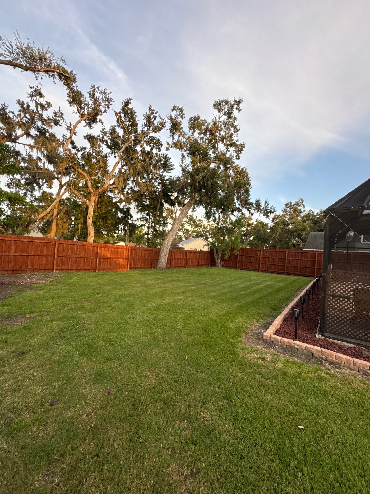 Wood Fence Installation using Pre-stained Pine Board On Board by Asap fence and gates, LLC