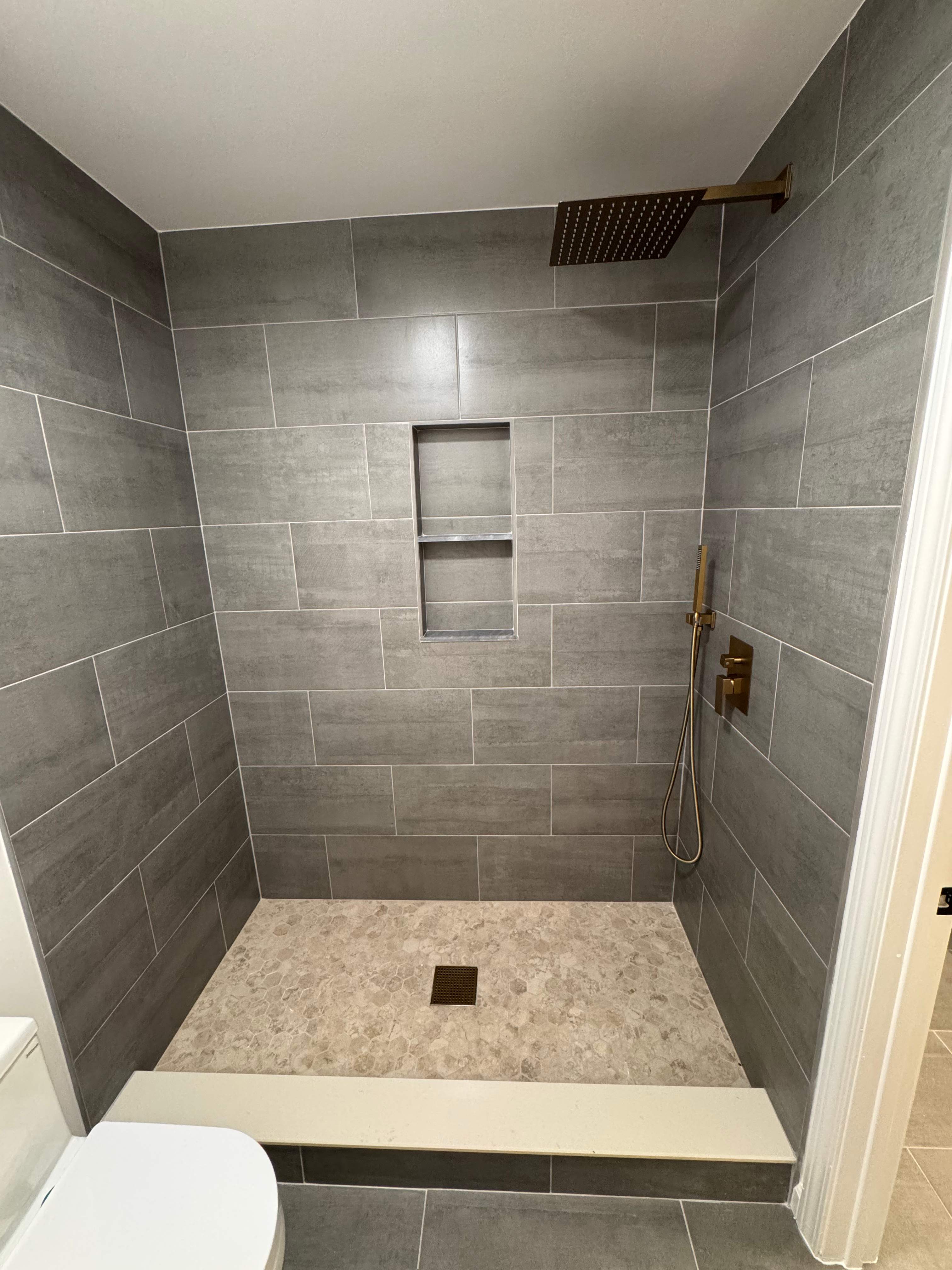 Jack and Jill bathroom renovation by Prudencio