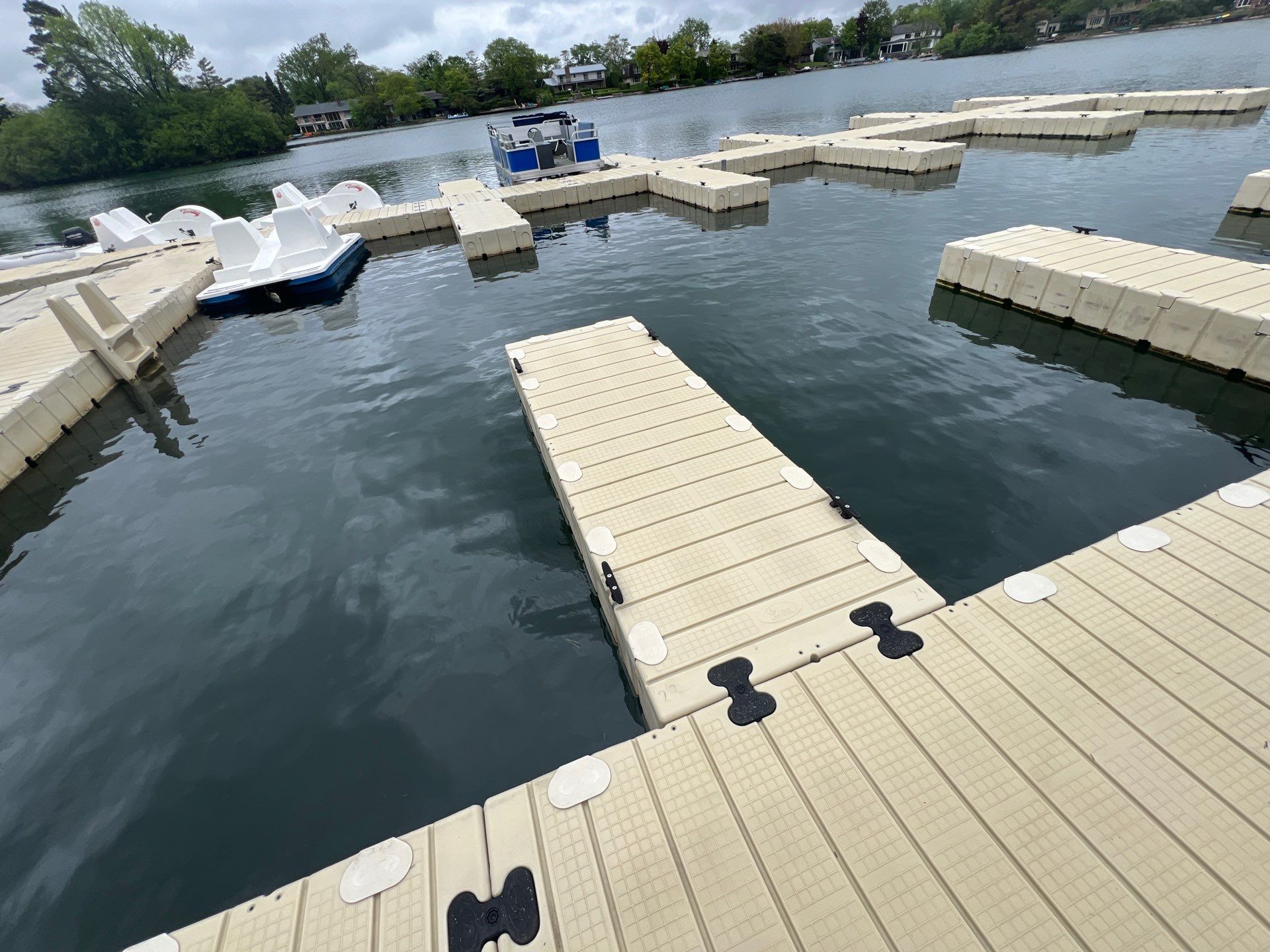 Power washing of floating dock by Northern Power Washing LLC.