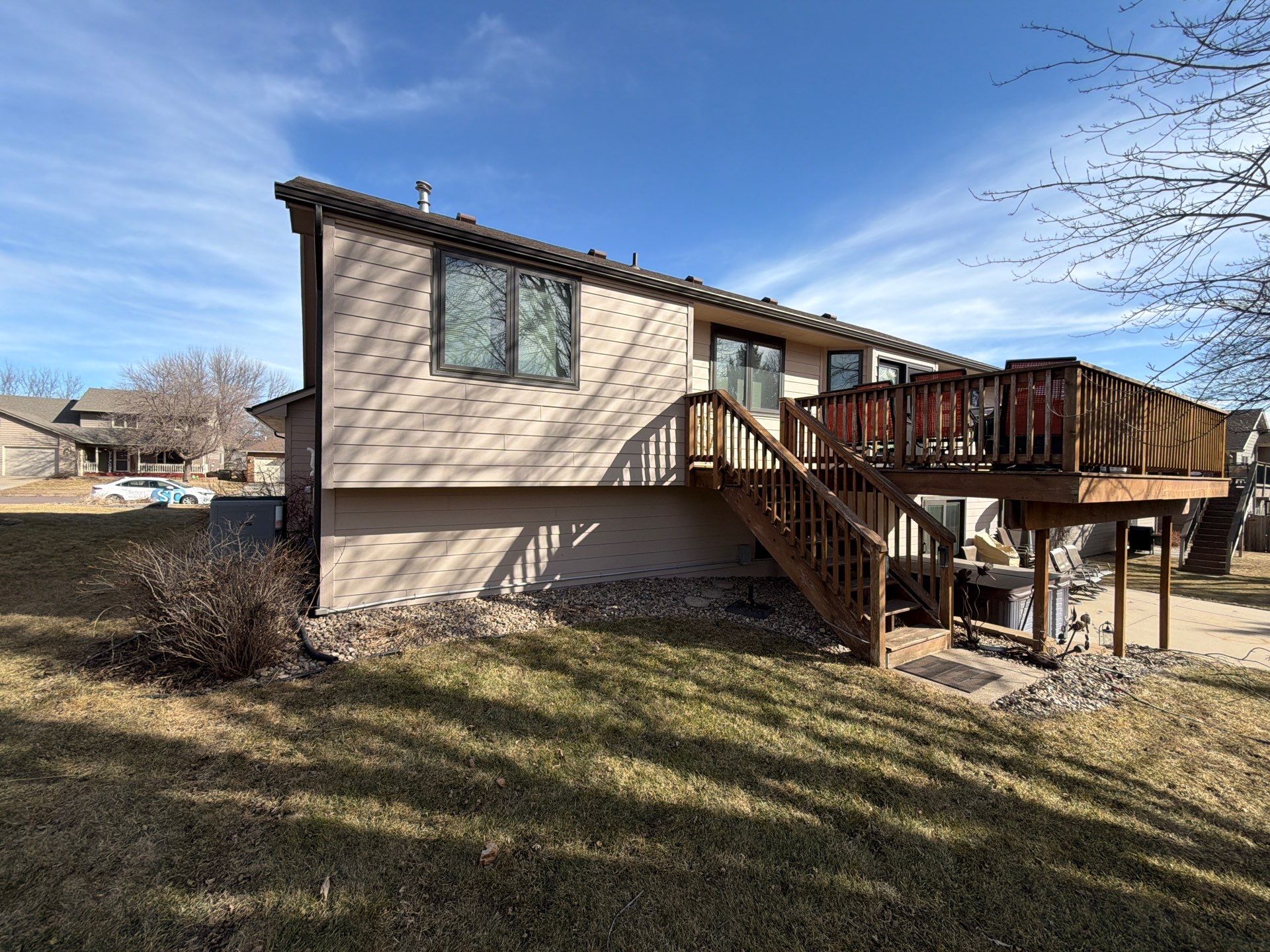 Residential Exterior Painting and Trim Restoration in Sioux Falls by Select Painting, Coatings & Garage Cabinets