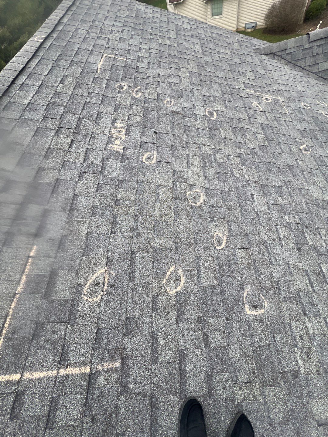 Exterior Installation using Onyx Black Durations and White Siding by WIW Enterprises Inc