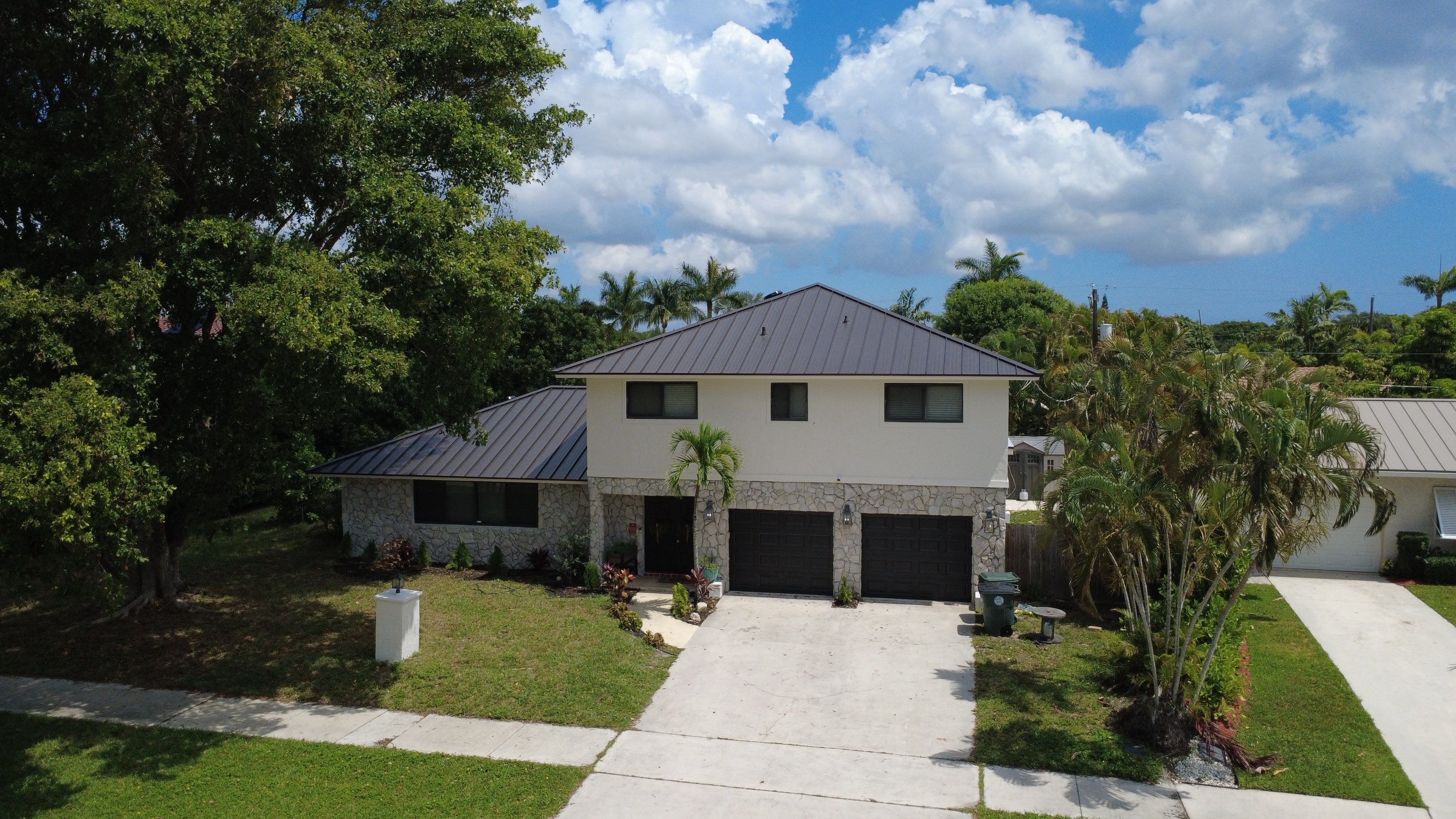 Residential Roofing Installation using 1.5'' Mechanical Seam by BLUES BROTHERS ROOFING