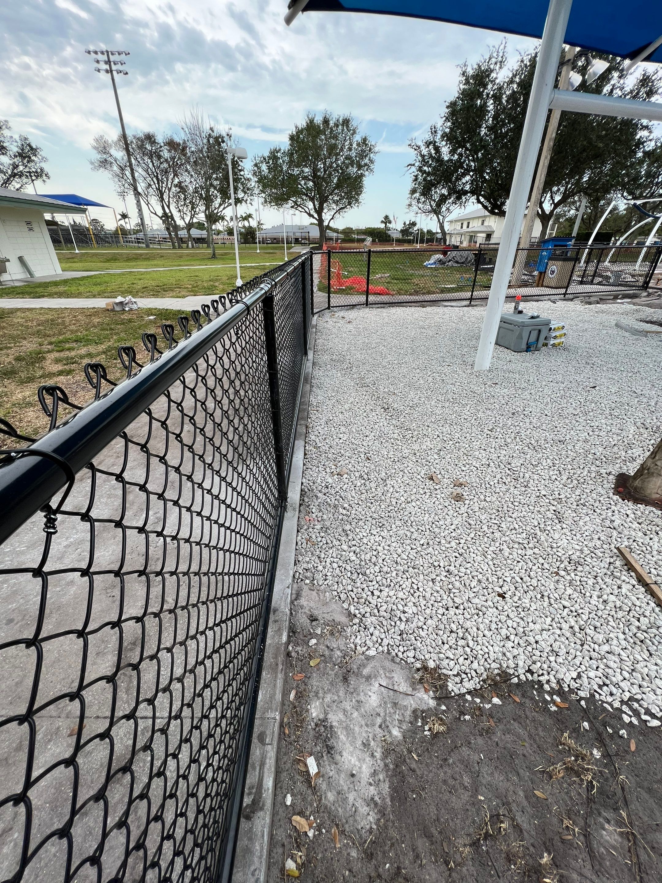 Vinyl Coated Chain-link fence for the City of Naples around Fleischmann Park Playground.  by Asap fence and gates, LLC