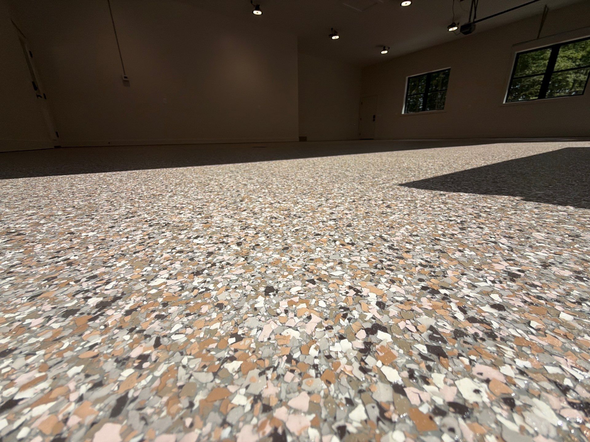 Garage and Screened Porch Polyaspartic Flake Floor Coating in Fremont by Gordon Painting