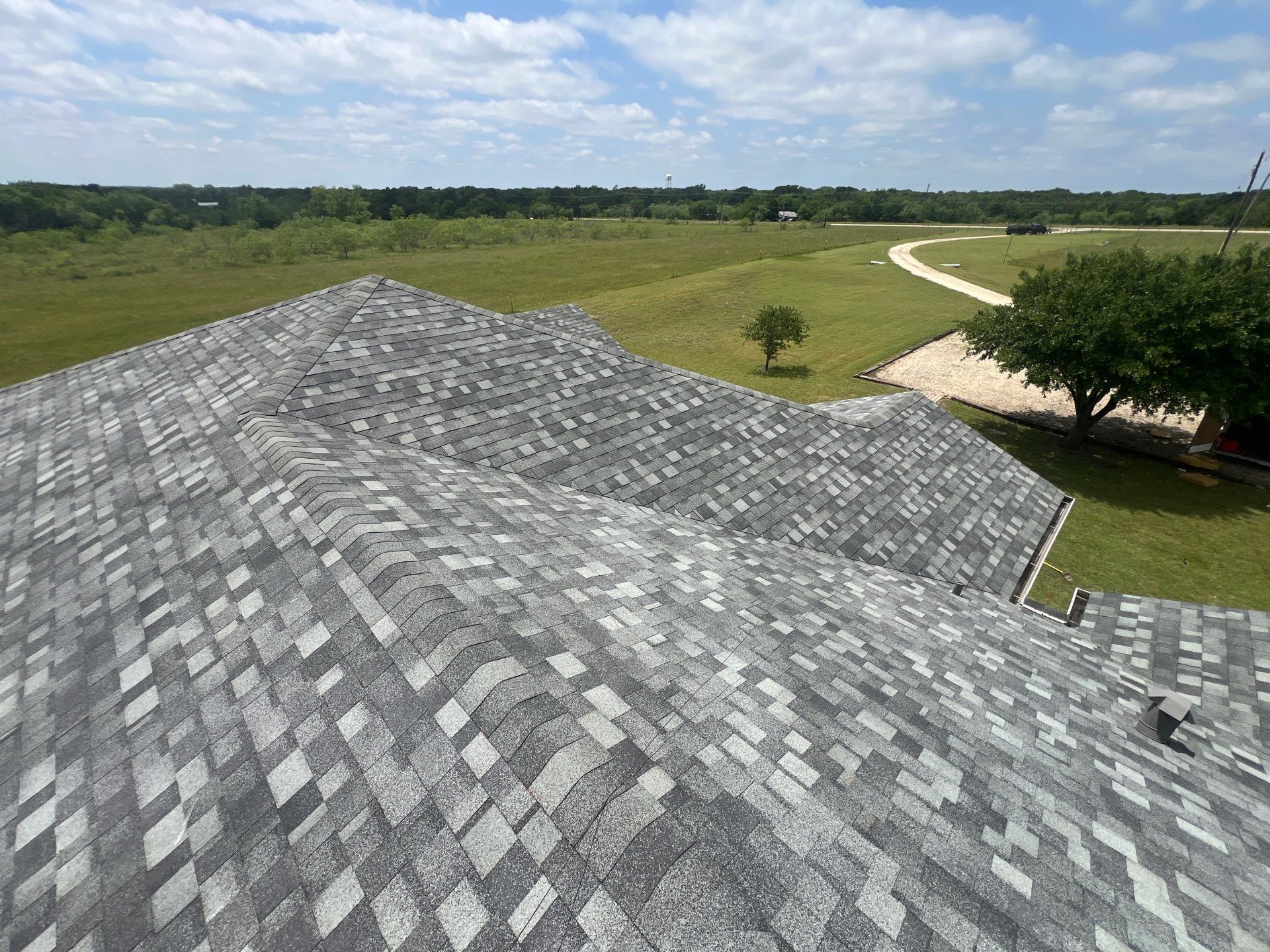 Residential Roofing Installation using IKO Dynasty Class 3 Impact Resistant Architectural Shingles. Color: Castle Grey by WR Roofing Solutions