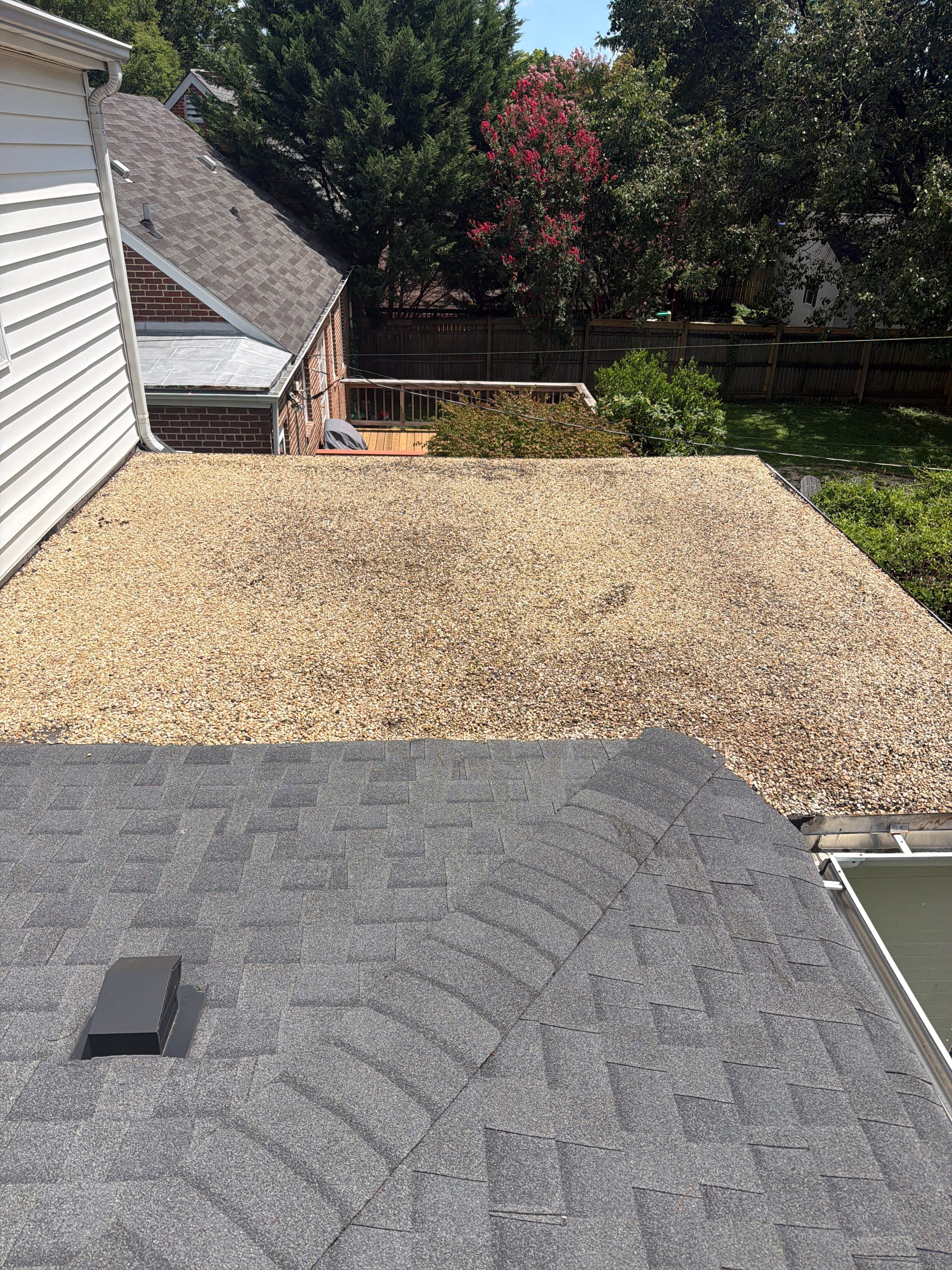 Richmond Roof Replacement Including Flat Membrane and Asphalt Shingles by Cade Construction