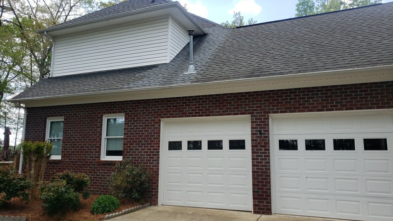 House Wash using cleaner by Power Wash Masters LLC