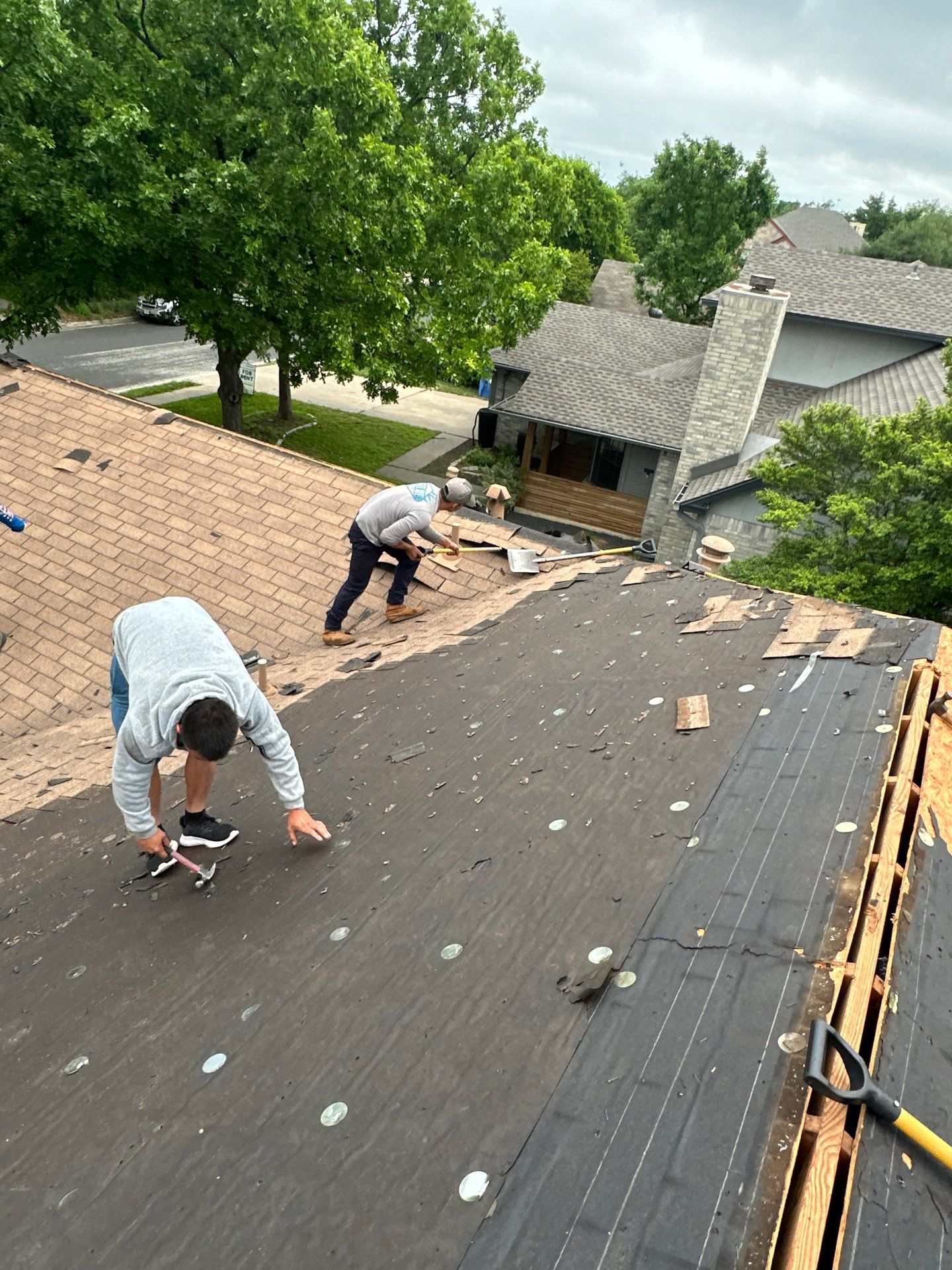 Residential Roofing Installation using Owens Corning Oakridge Onyx Black by DeZign Roofing & Exteriors