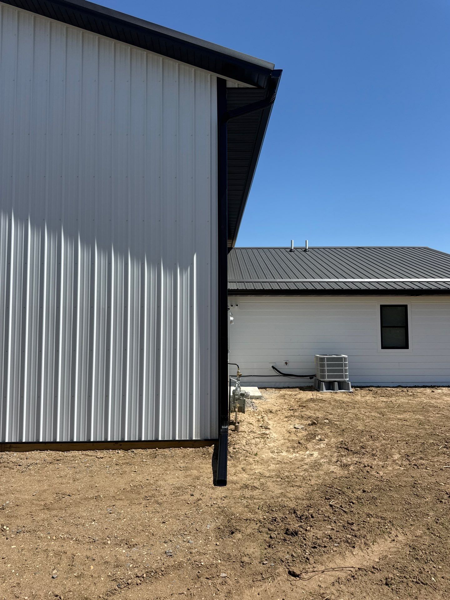 Black Gutter Installation + Snow Guards on Shouse by Next Level Seamless Gutters / Exteriors Inc.