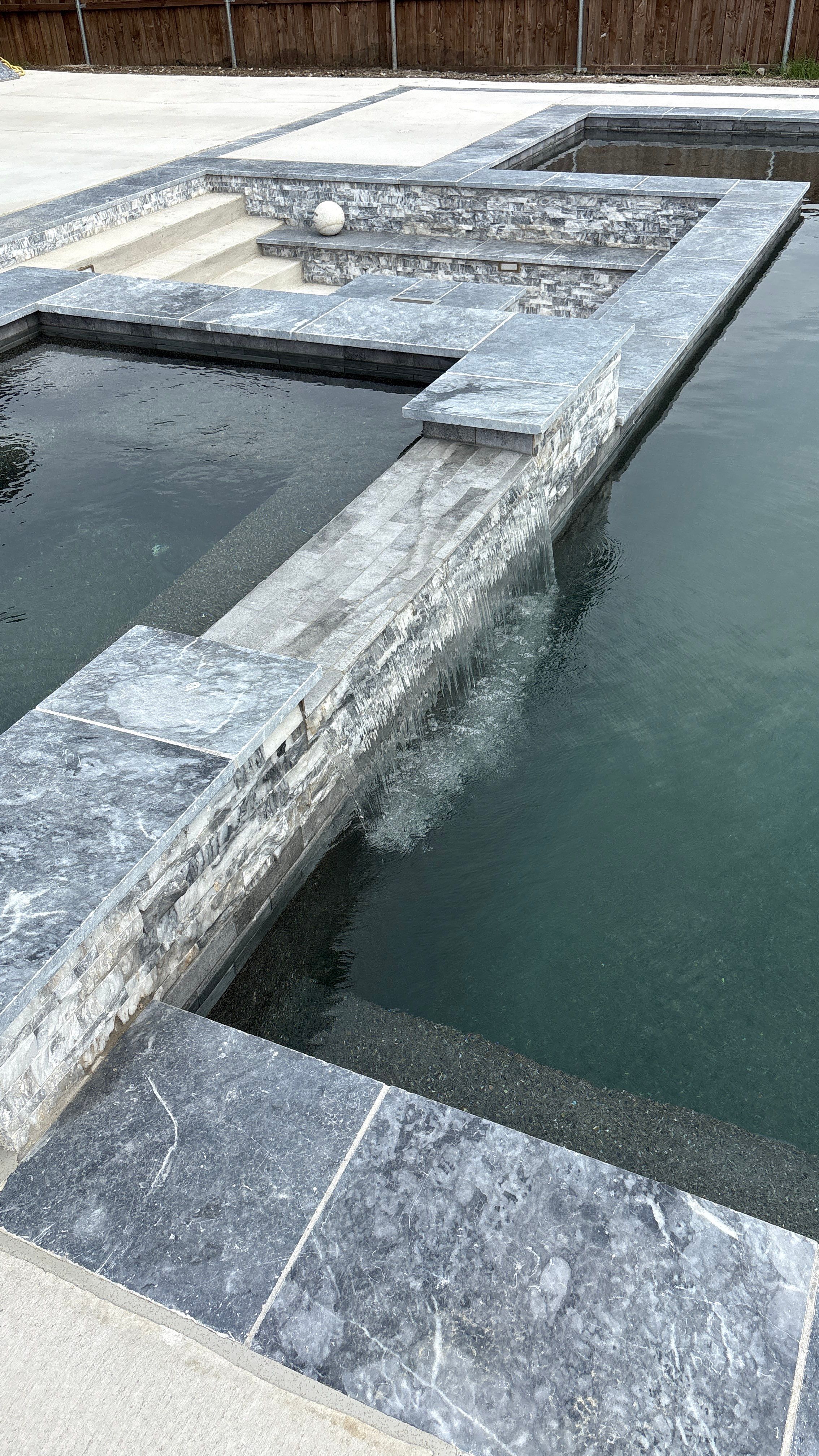 Geometric Pool with Raised Spa and Scupper Water Features by Pinnacle Pools and Spas - DFW